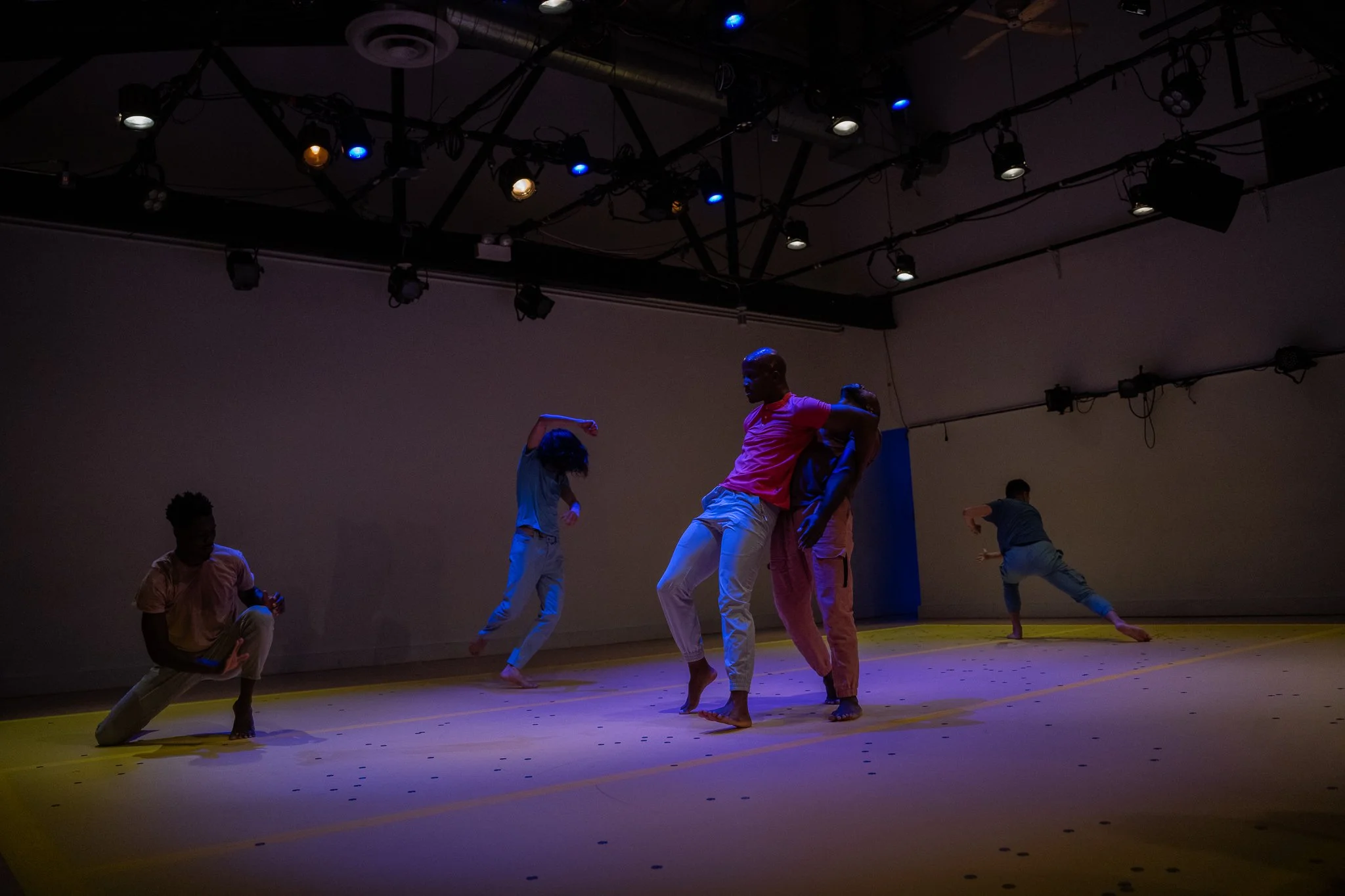 Ensemble improvisation on a coin-covered floor in The Righteous Beauty of the Things Never Accounted For by J'Sun Howard.