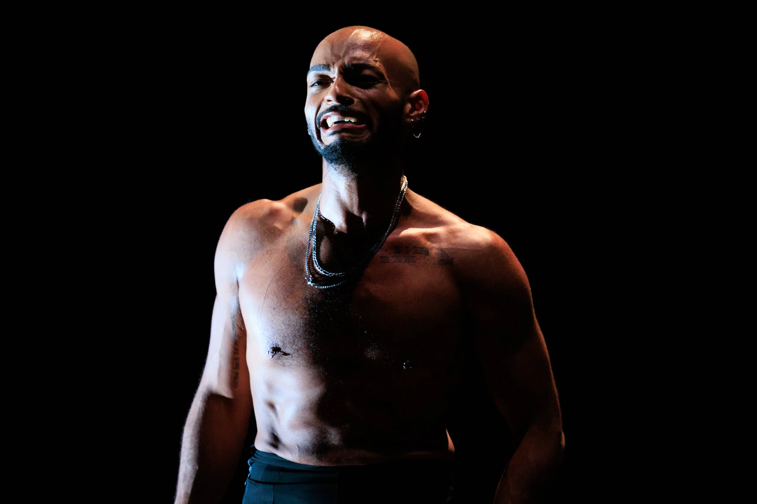 Joseph Stevens performing under stage lighting in Sissies: Something Perfect Between Ourselves.