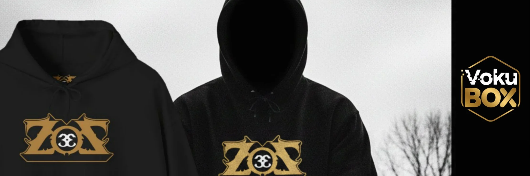 Black hoodies with gold and white logo featuring a stylized face, with a leafless tree and gray sky background.