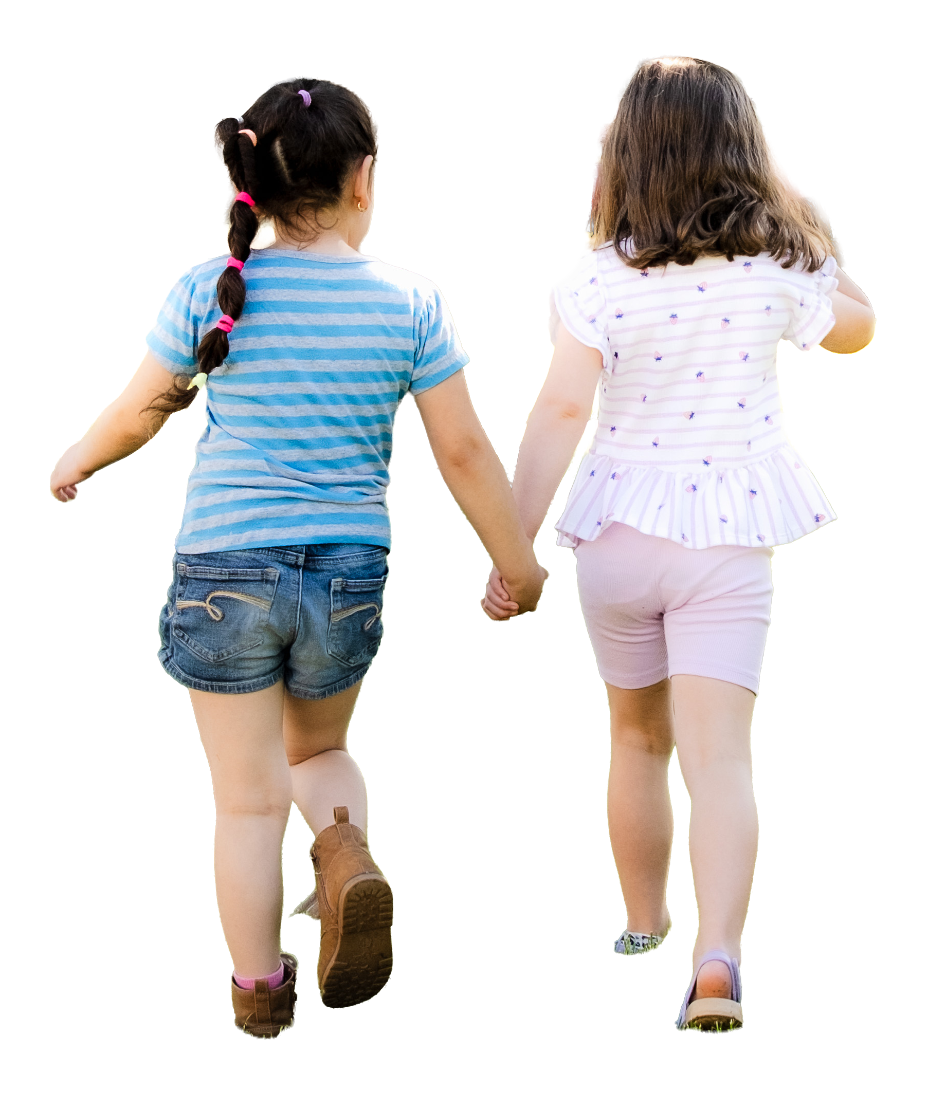Two young girls holding hands, viewed from behind, walking together.