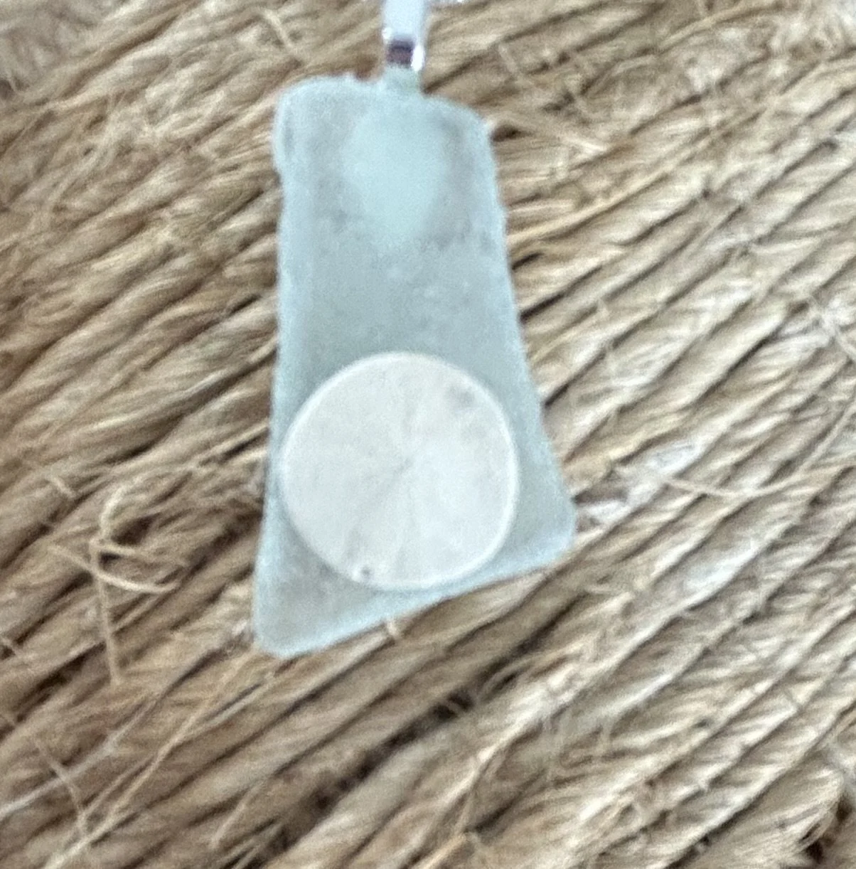 Not only did I find this sea glass, but I found the  tiny sand Dollar with it!
