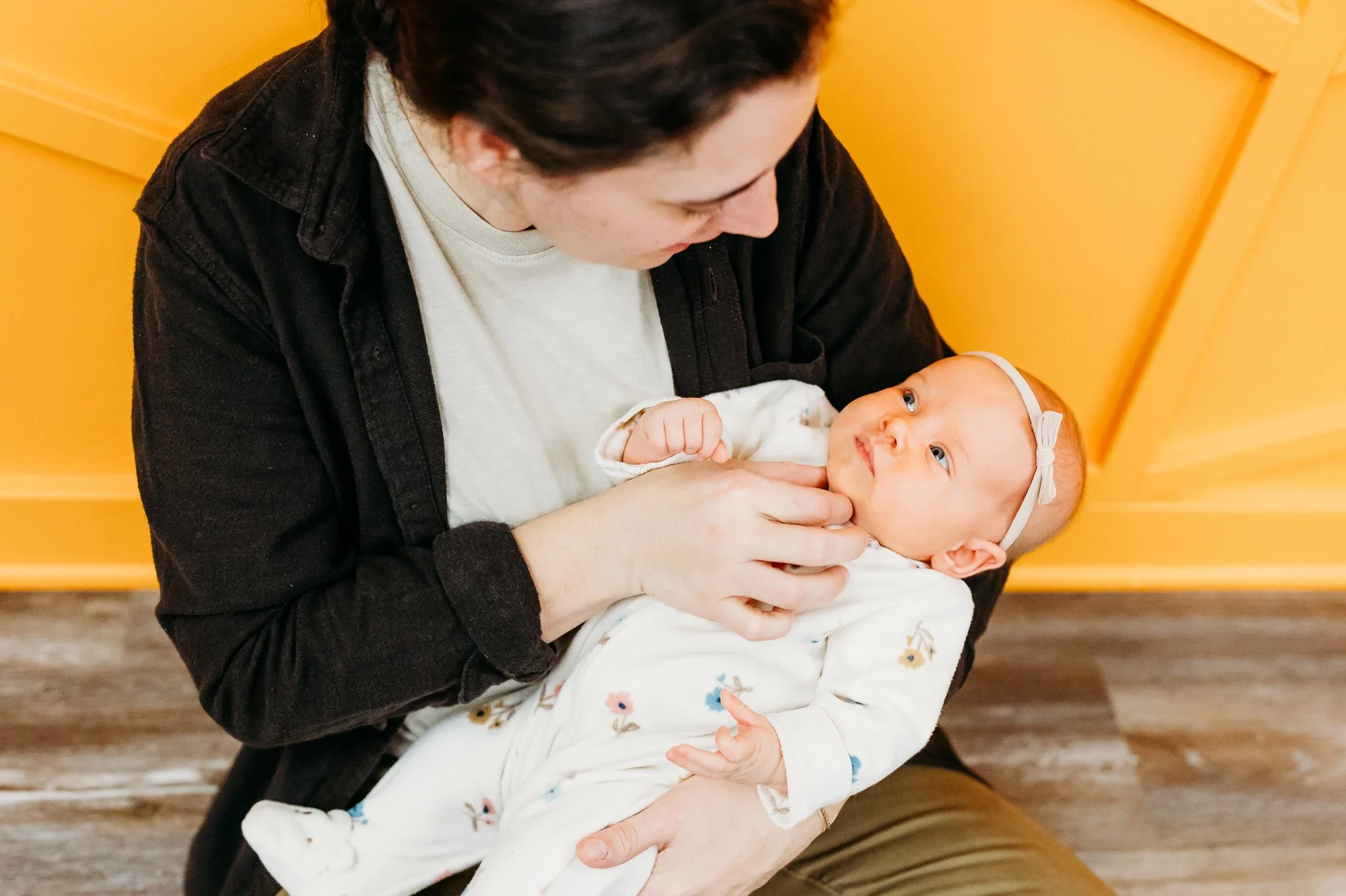 Dr. Gabi working with an infant, using bodywork techniques, in physical therapy