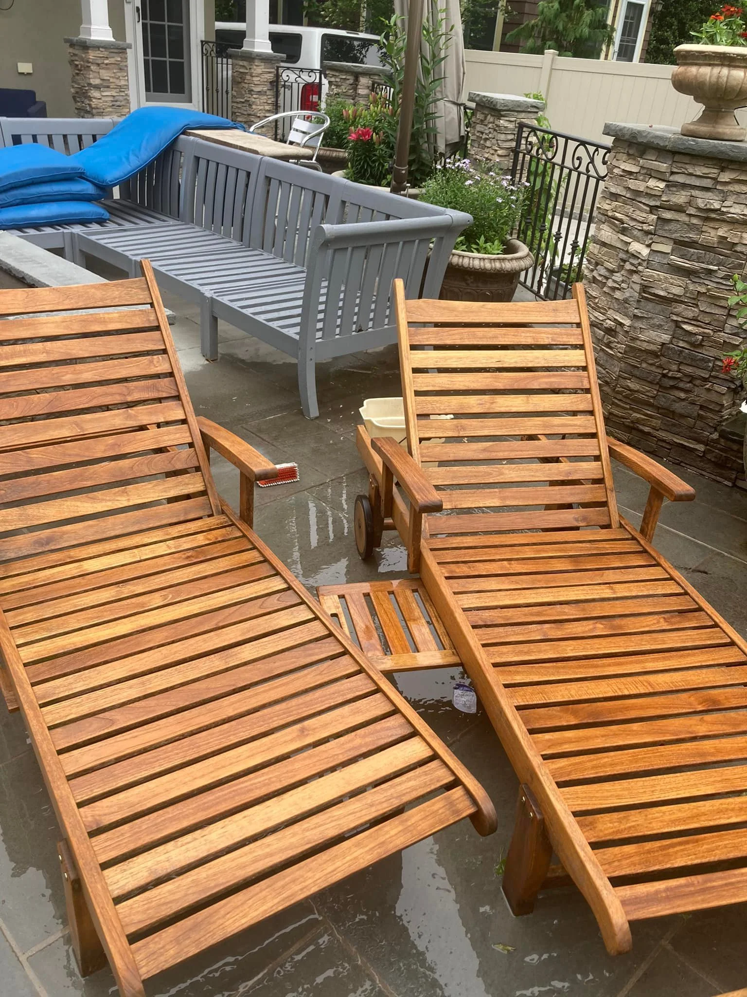 teak wood lounge chairs after restoration