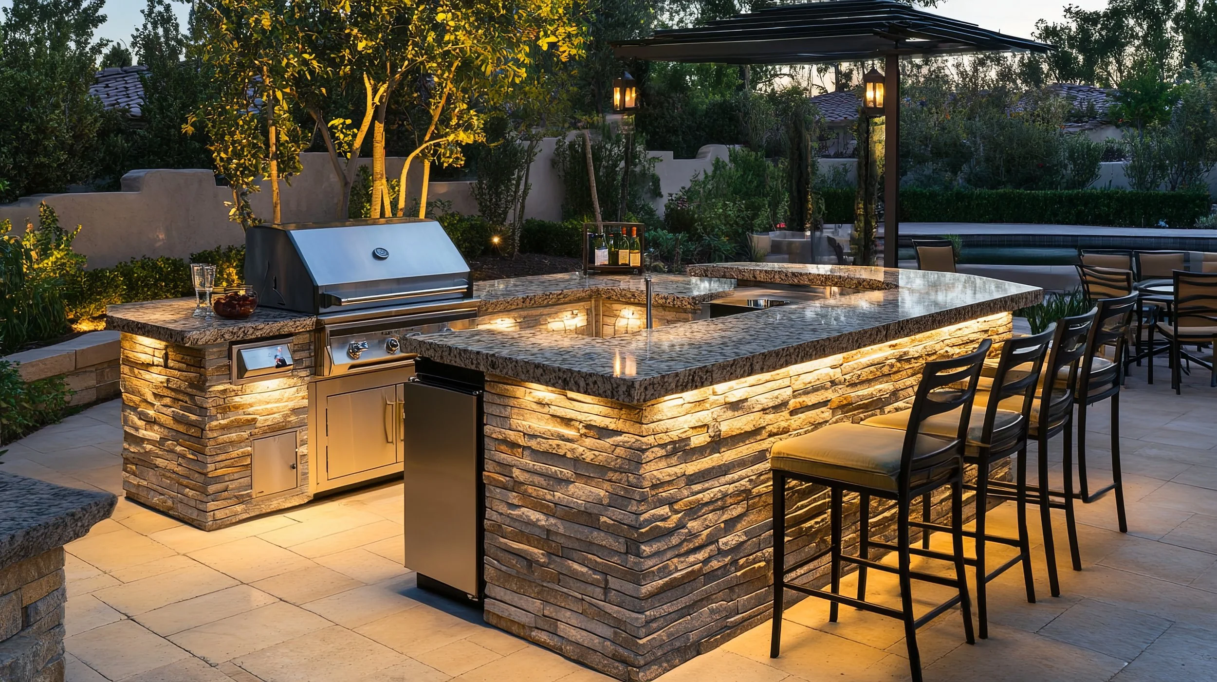 Custom outdoor kitchen and bar in St. Tammany Parish by Gulf South Pools & Outdoors.