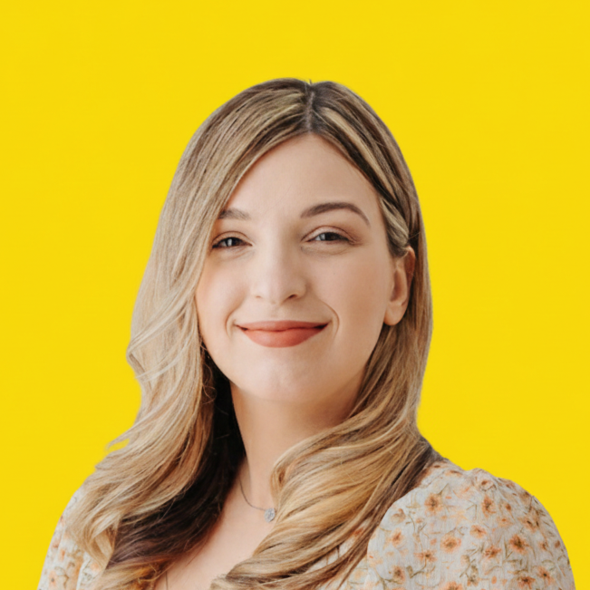 Headshot of Katherine Wainwright on yellow background