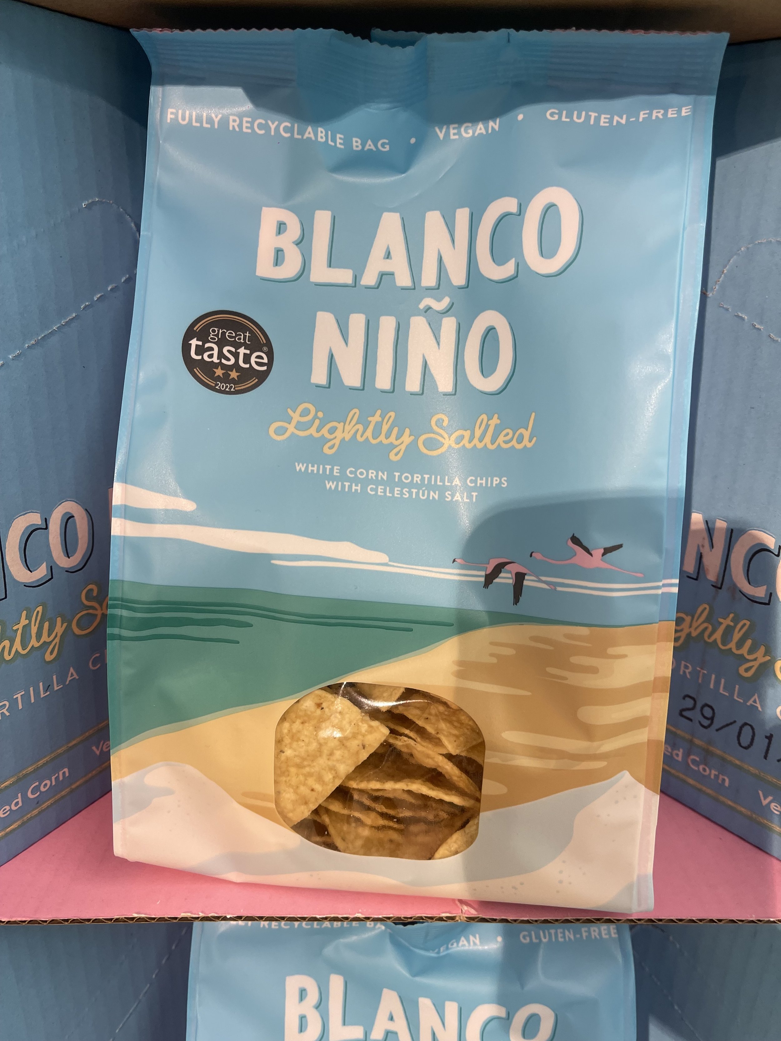 Blanco Niño premium tortilla chips in UK retail, illustrating how a culturally rooted brand can enter the mainstream through a familiar snacking category and earn trial without requiring shoppers to begin with cuisine education.