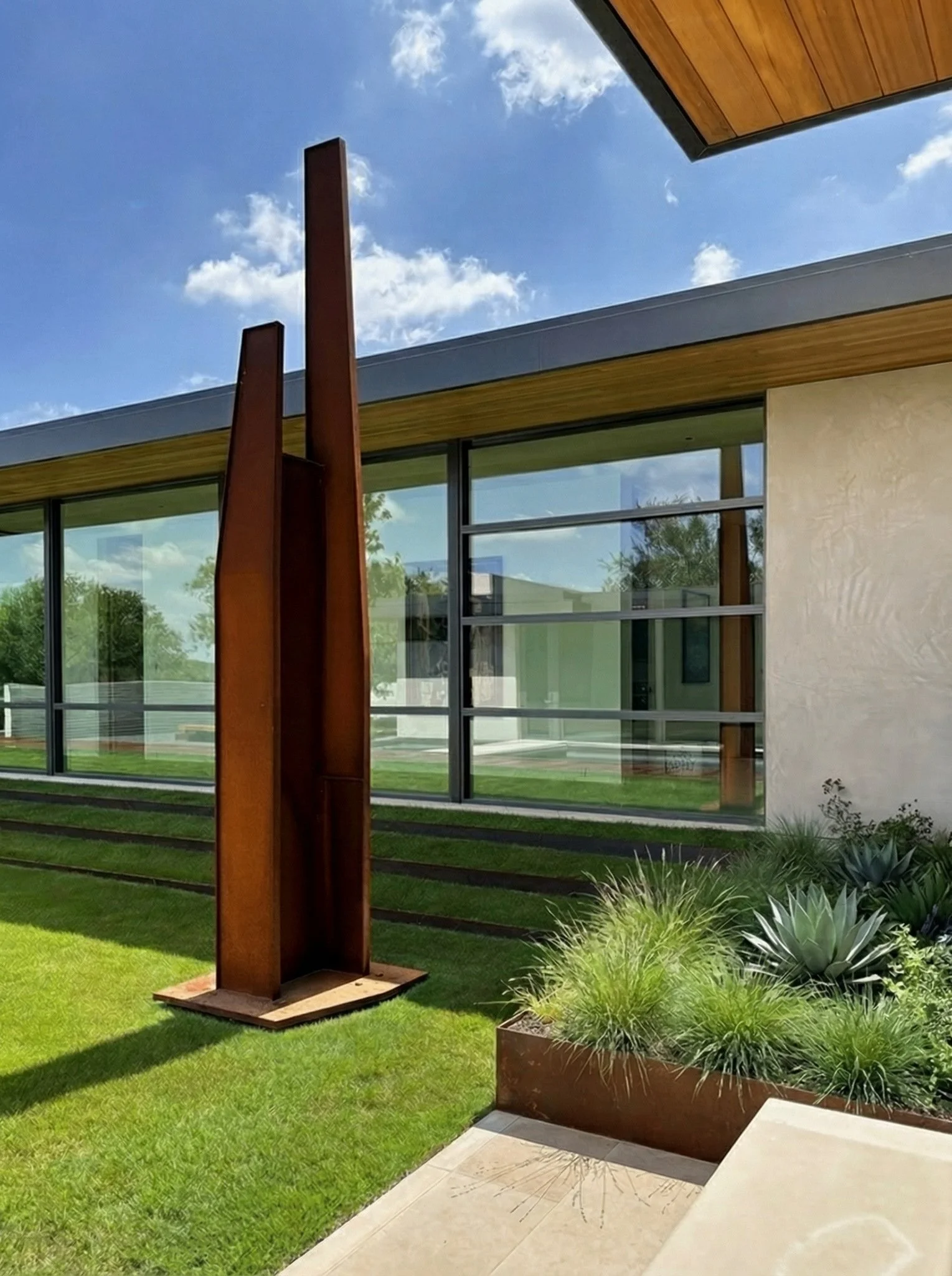 Courtyard view with Cot-ten Sculpture by Jonathan Nesci