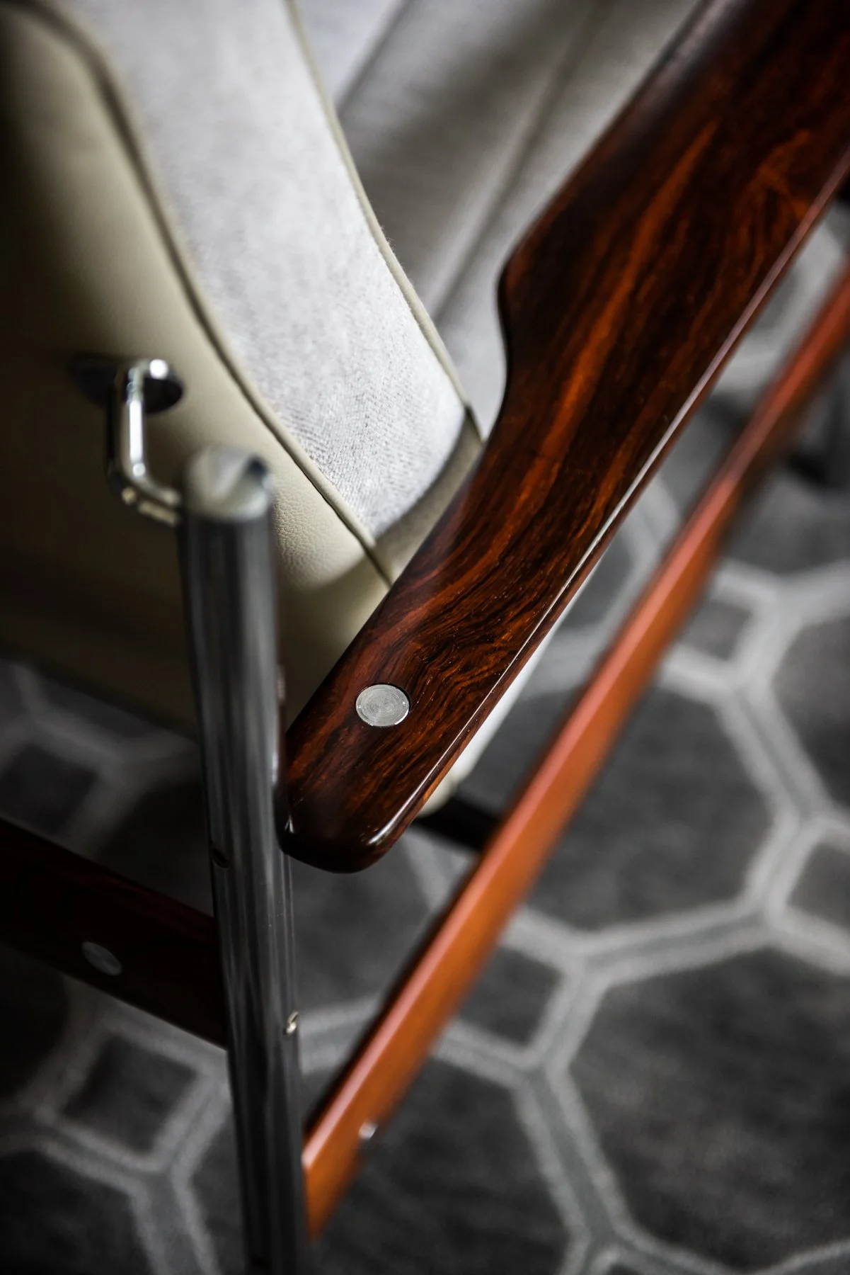 Mid century modern lounge chair detail with rosewood armrest and chrome frame BY SVEN IVAR DYSTHE, Norwegian
