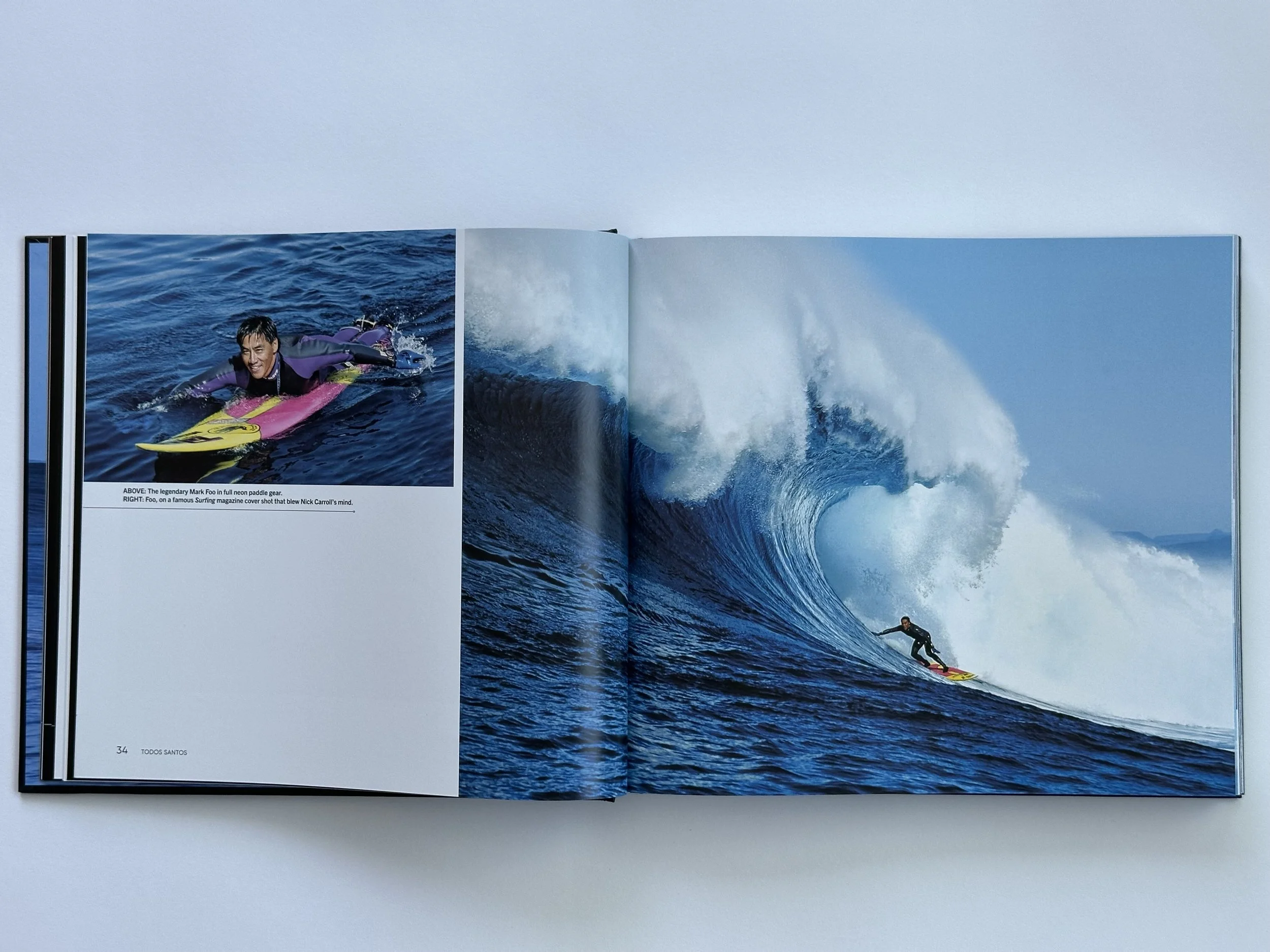 Pages within Pacific Quests book. Features surfers on a large wave.