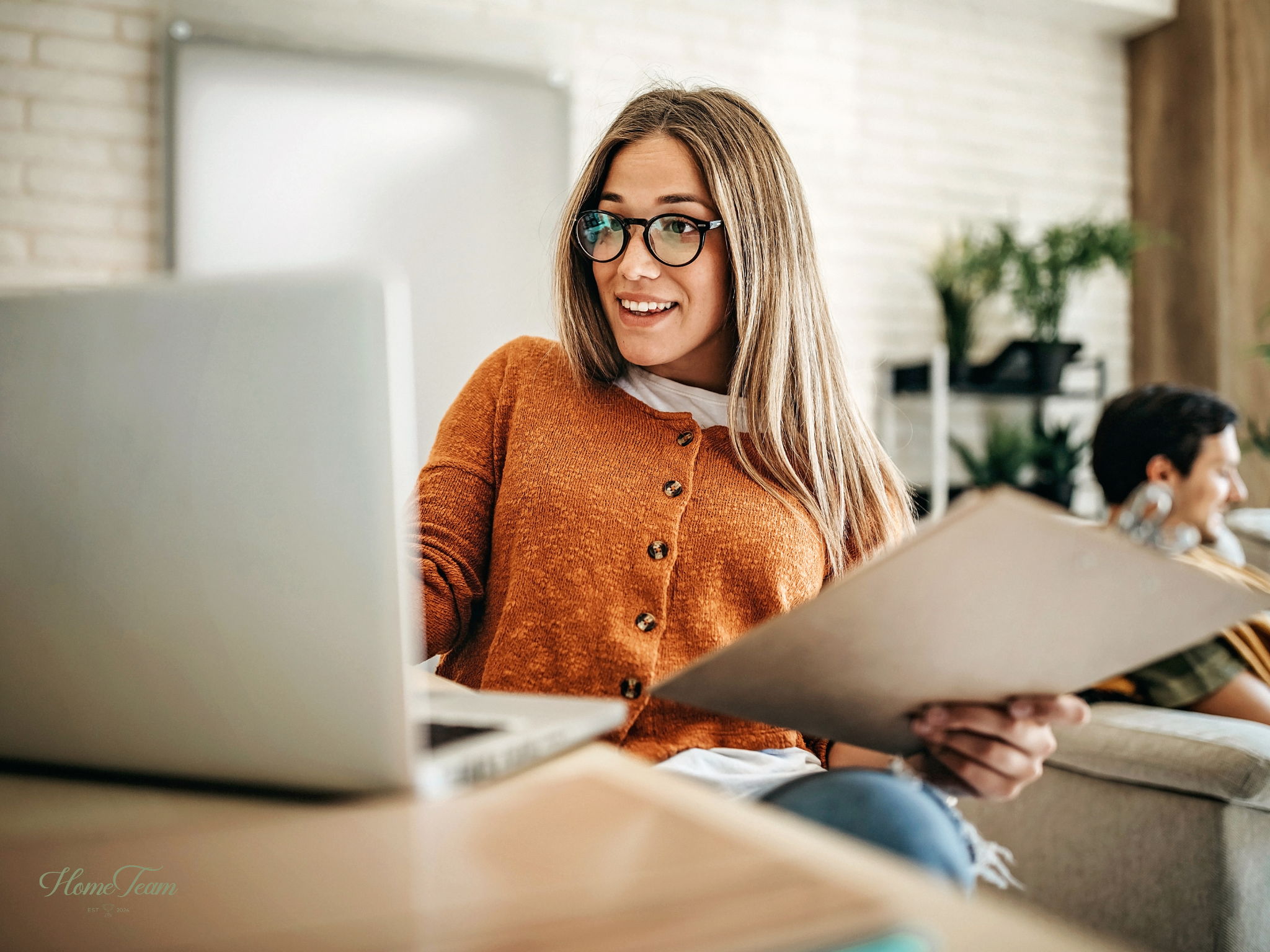 woman returning to work after maternity leave at deak