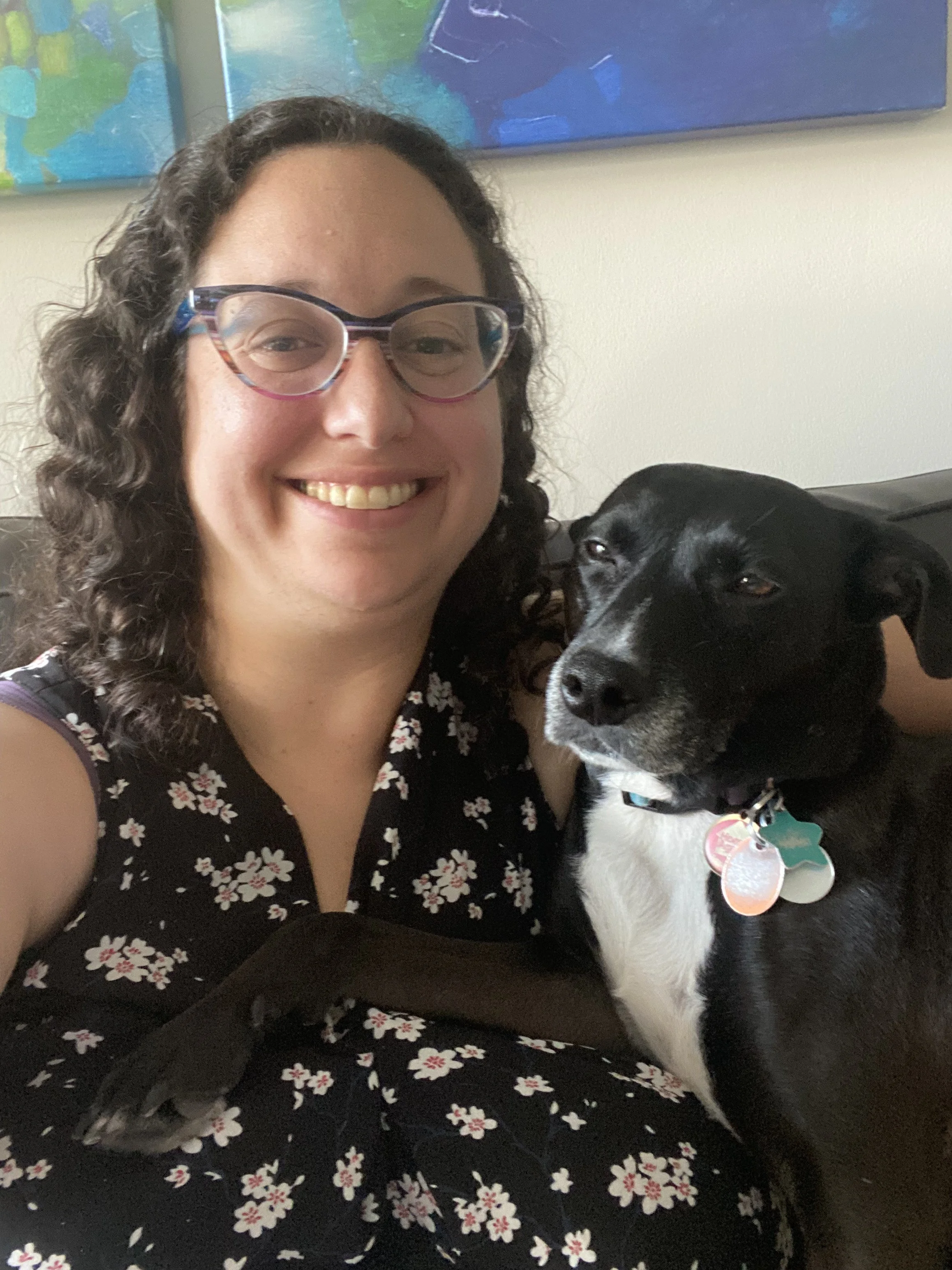 Dr. Elizabeth Gordon with her rescue dog Harriet — the unofficial mascot and occasional virtual session guest at Elizabeth Gordon Psychology
