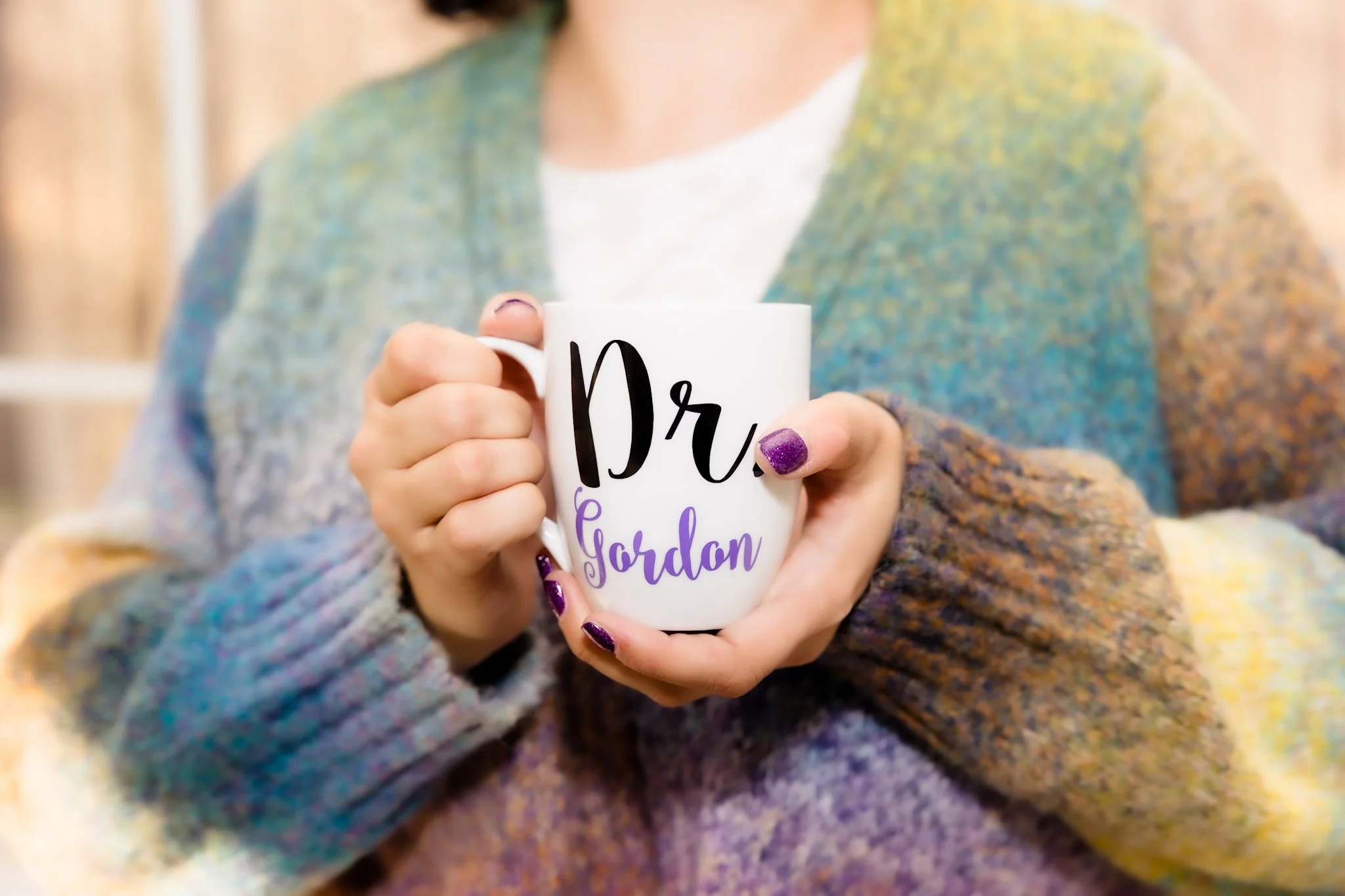 Dr. Elizabeth Gordon holding her 'Dr. Gordon' mug — eating disorder and anxiety therapist in Silver Spring, MD