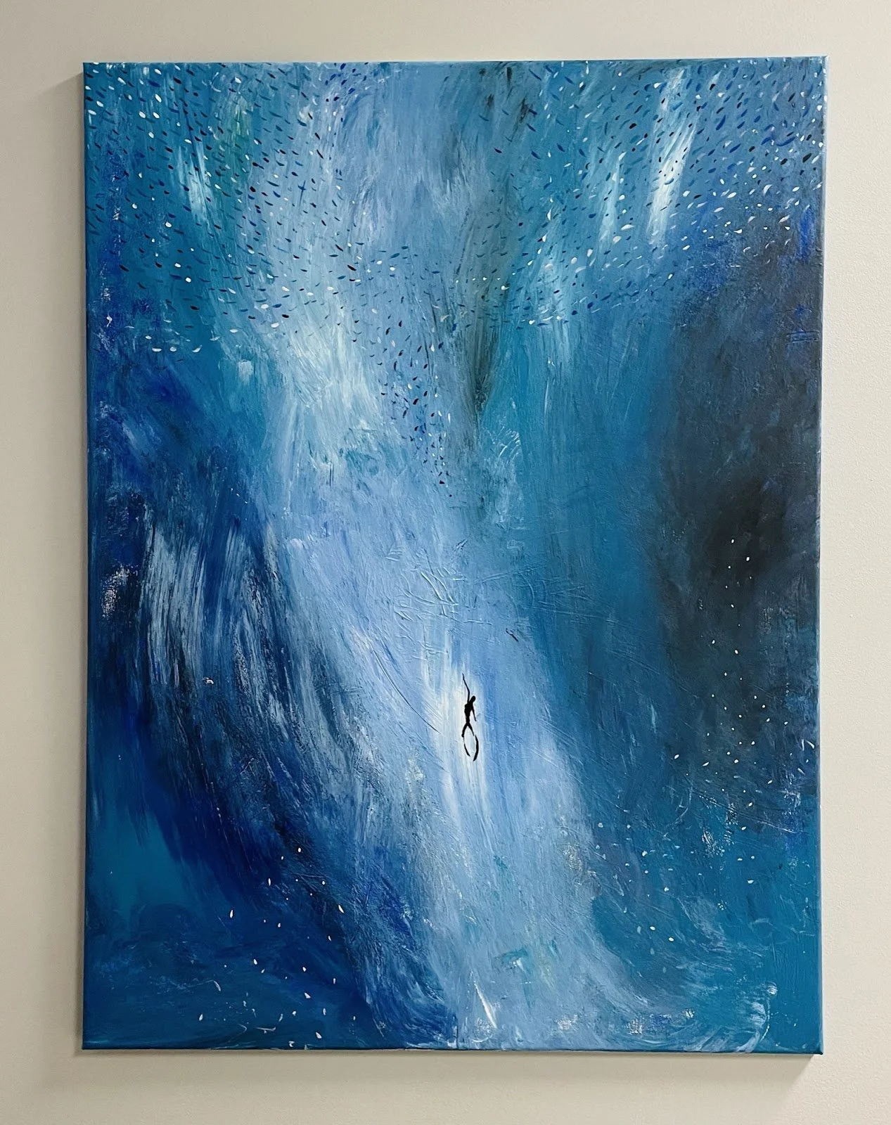 Abstract blue painting with white and dark blue accents, depicting a small figure hanging from a rope in a dynamic, swirling background.