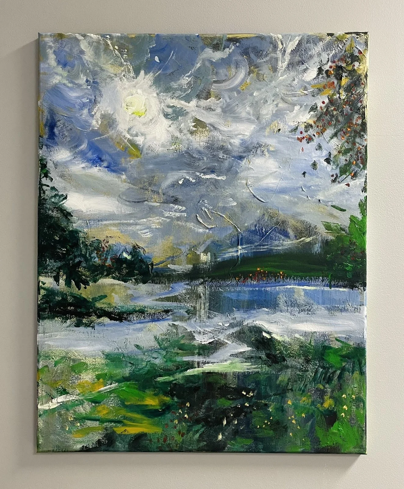 An impressionist-style landscape painting depicting a cloudy sky, a body of water, and green vegetation with hills in the background.