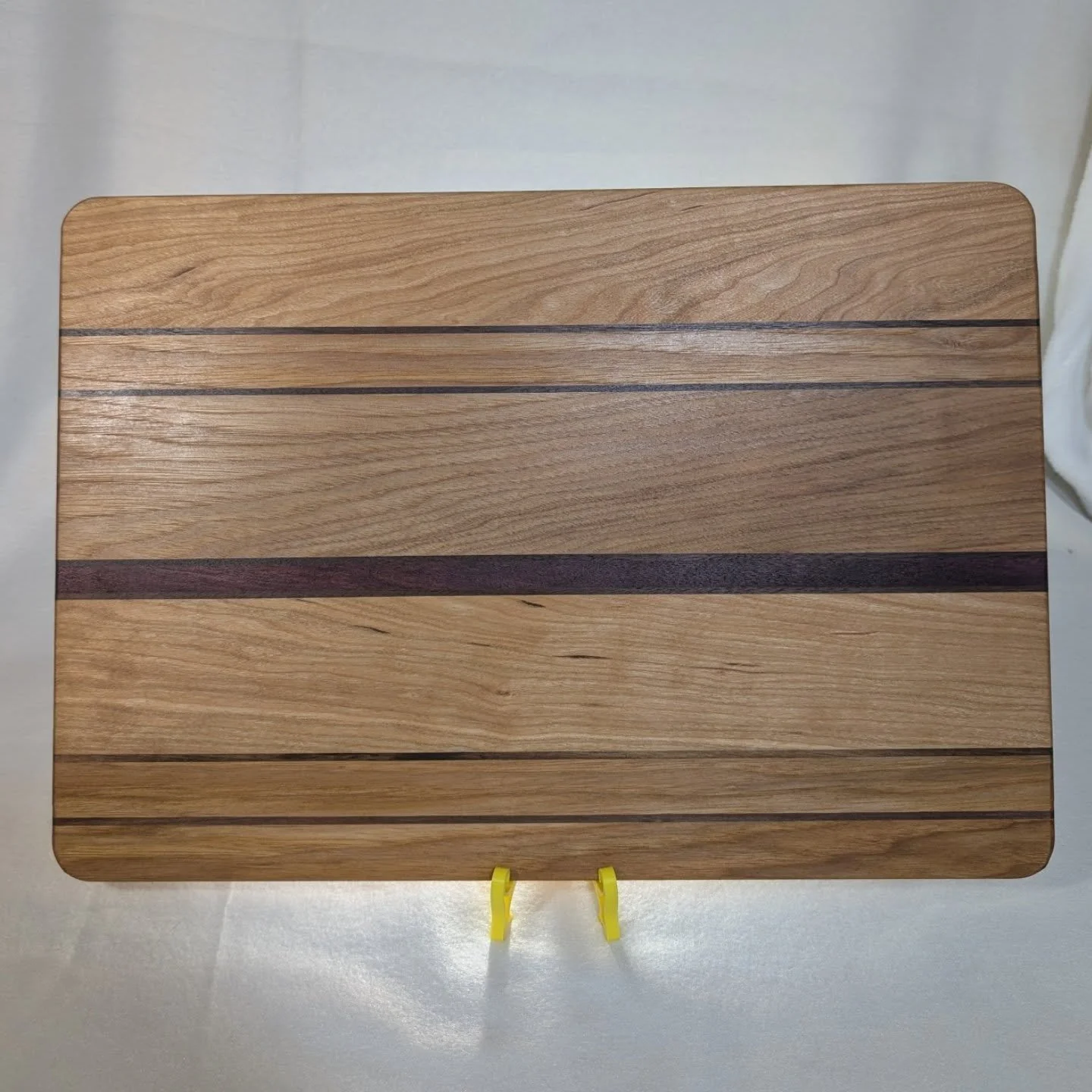 Cutting board made with #hickory #purpleheart #walnutwood and #cherrywood