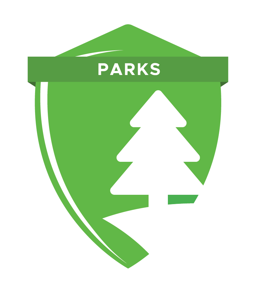 A green shield-shaped logo with a white silhouette of a pine tree and a road, and a banner reading 'PARKS' at the top.