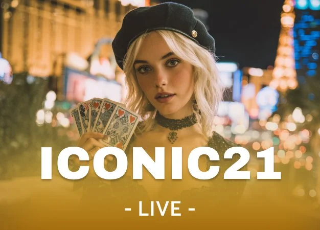 A young woman with blonde hair wearing a black beret and choker necklace, holding playing cards in front of a cityscape at night, with the text 'ICONIC21 LIVE' overlaid.