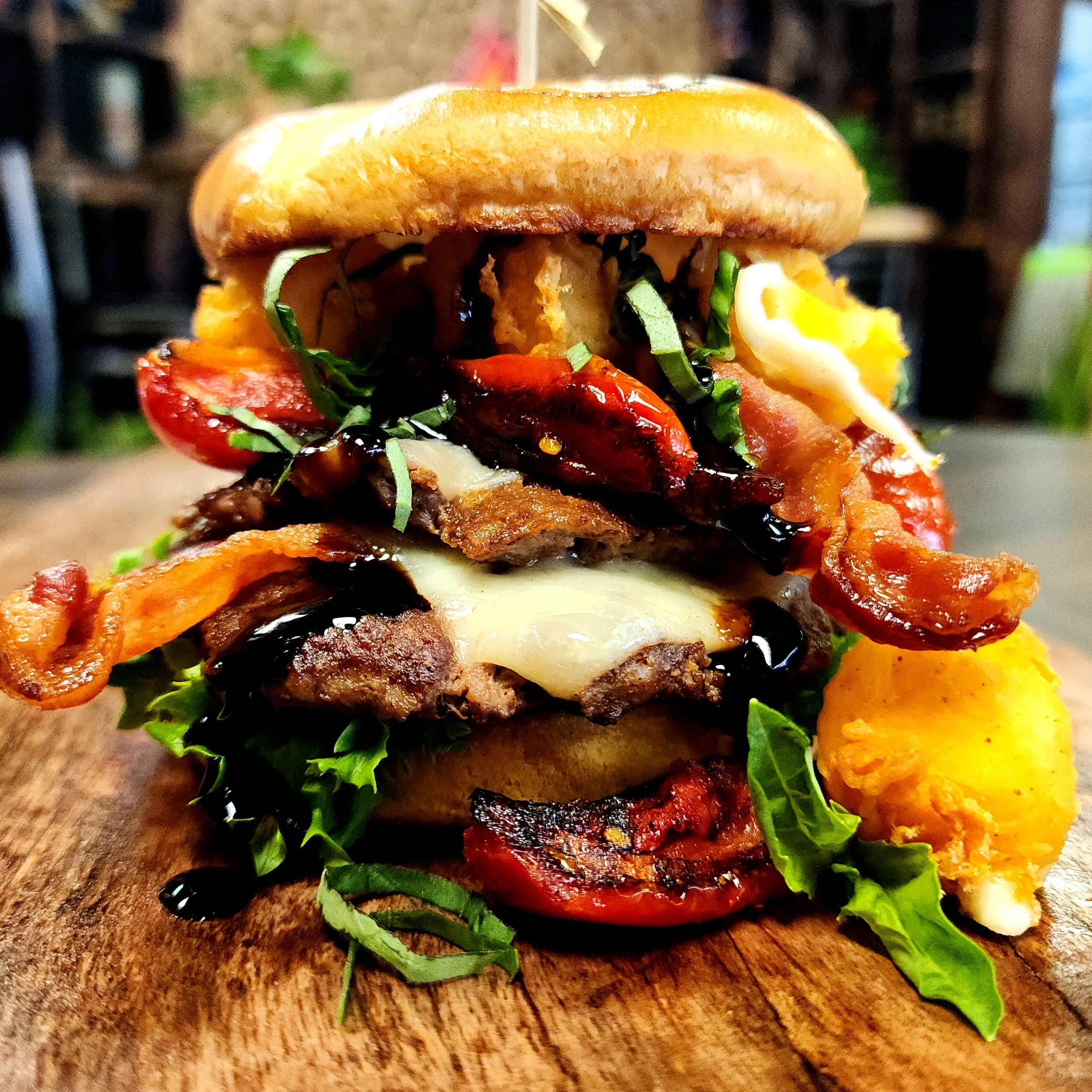 "Caprese" - Deep Fried Mozzarella, Fire Roasted Tomatoes, Basil Chiffonade, & Balsamic Reduction