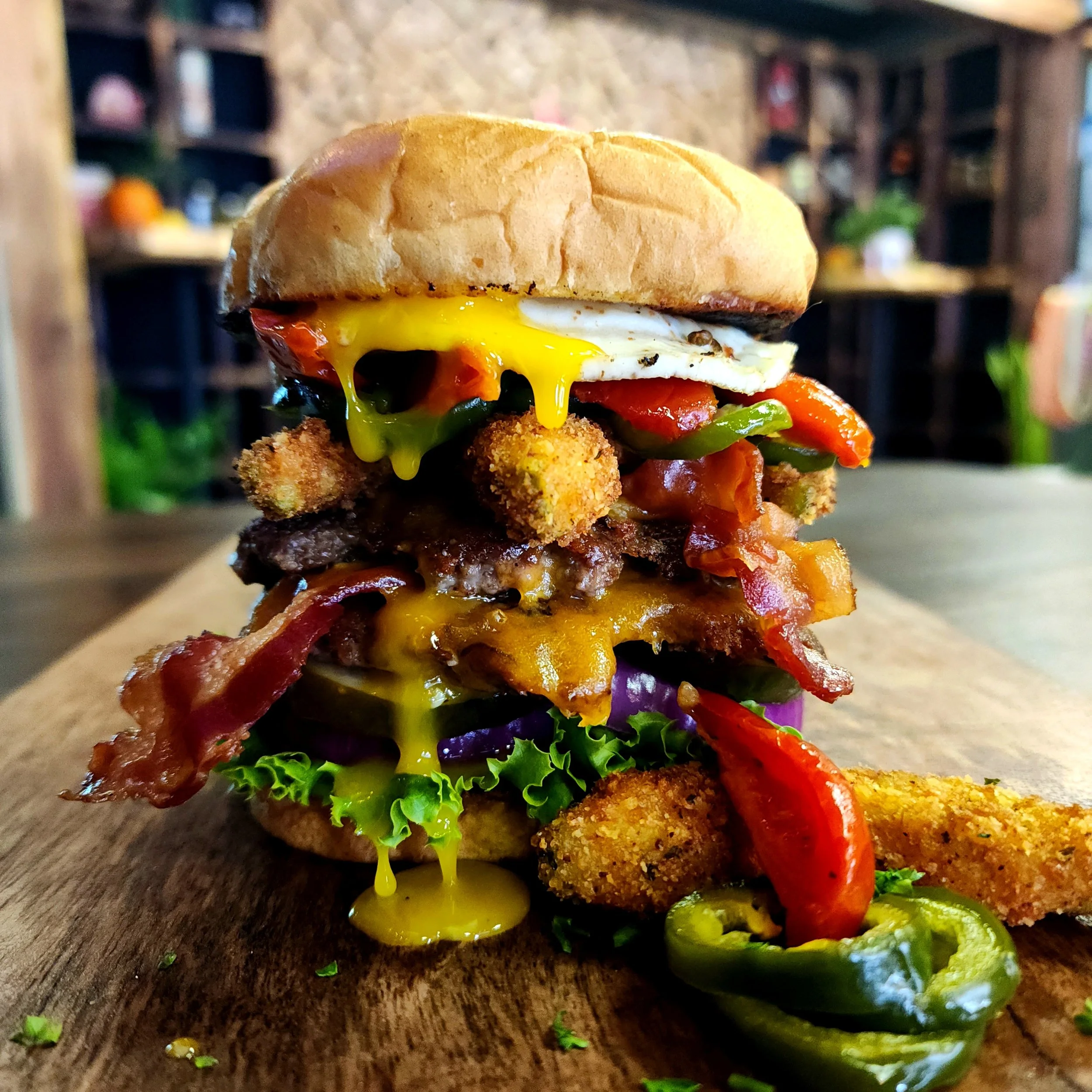 "West Coast Smash" - Sunny Side Up Egg, Fire Roasted Tomatoes, & Deep Fried Avocado Fries
