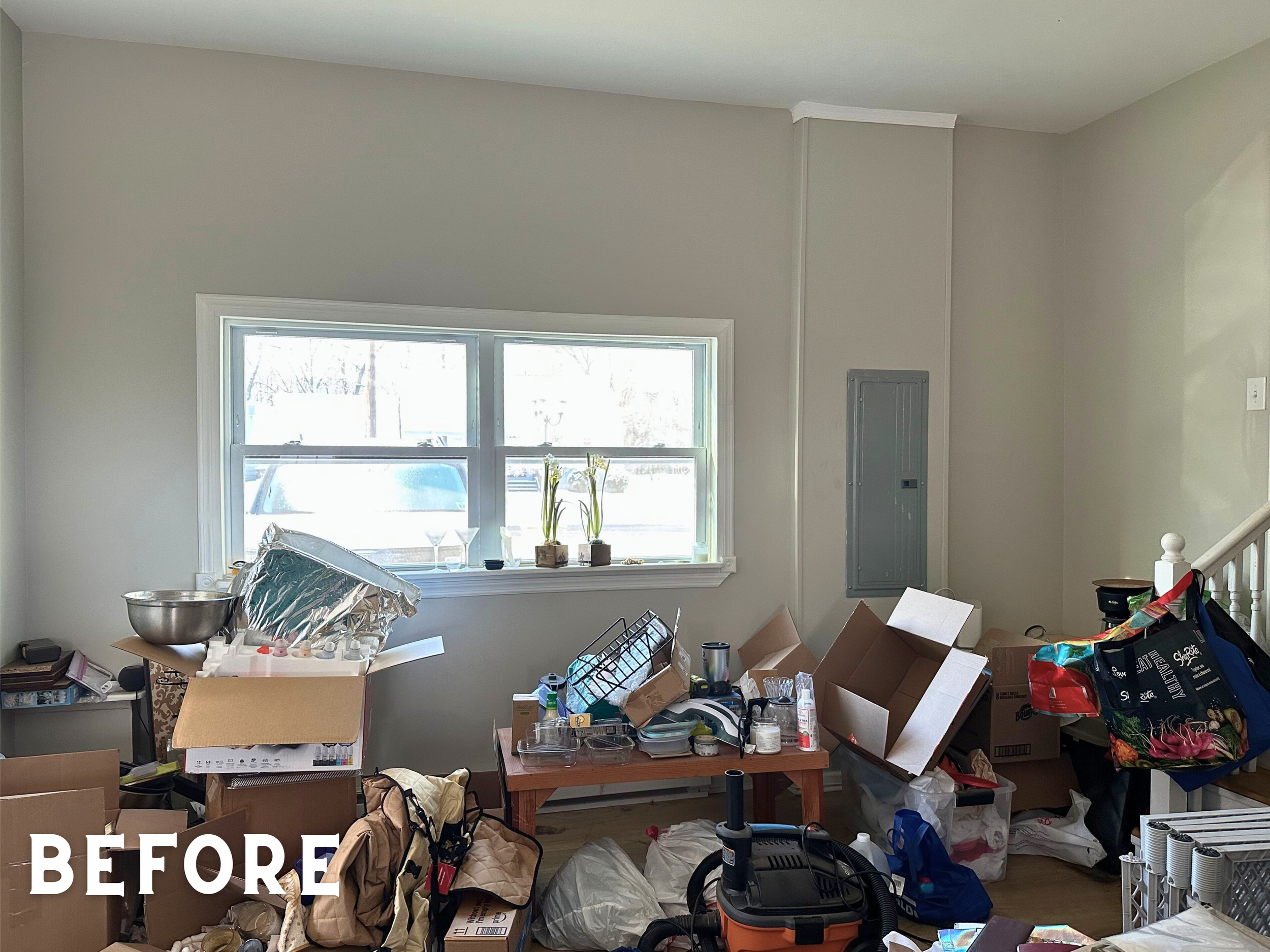 After moving into her home, my client was overwhelmed by unpacking. When I finished with this space, she was finally able to utilize the other half of her house. Now, she has a secondary living room, clear path to her laundry and office, a comfortabl