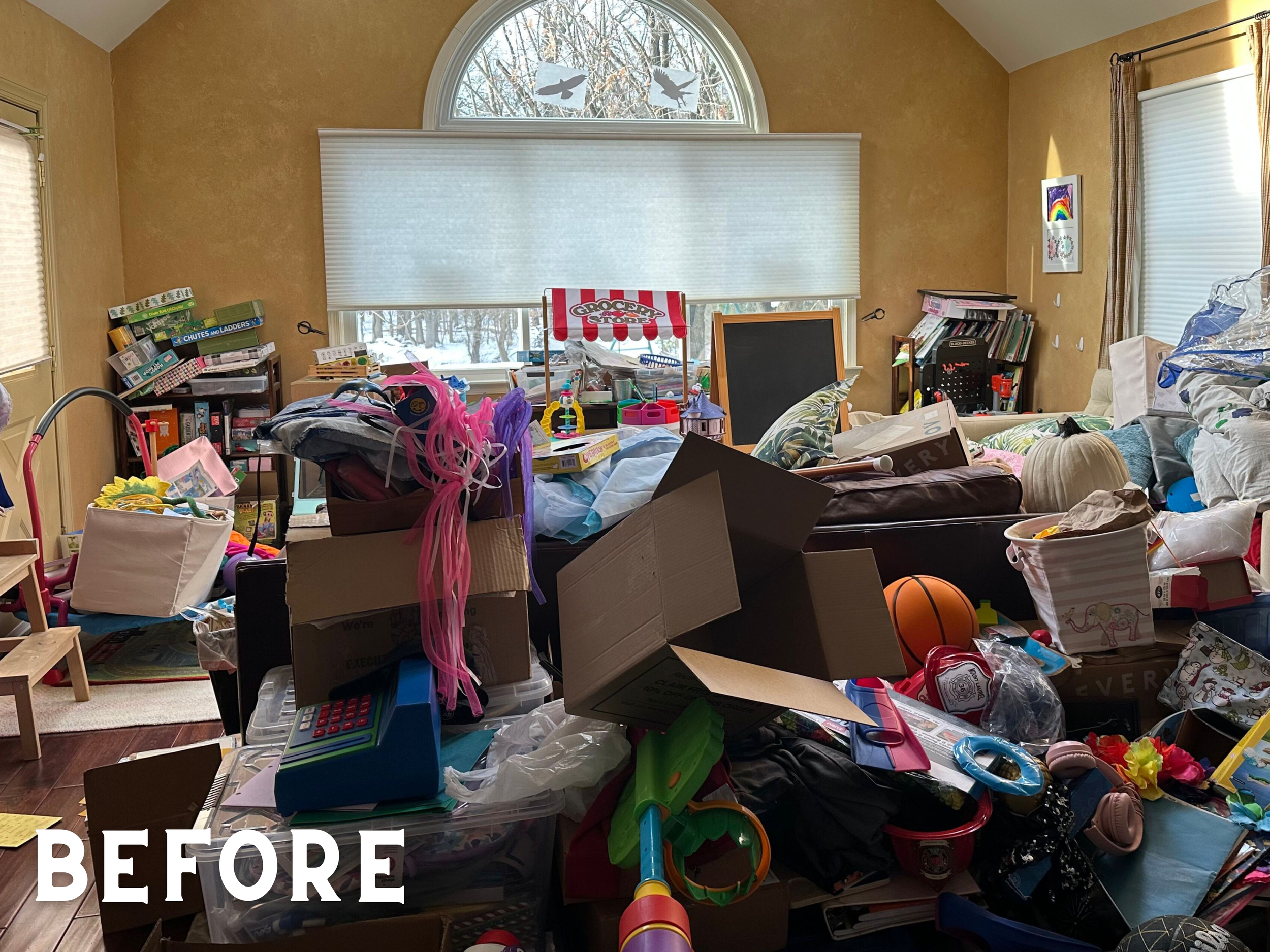 Are your kids running out of space to play? I can help with that! When I got done with this play room, my client's kids had space to work on their arts and crafts projects, pieces of toys were reunited with their sets and the floor was free of loose 