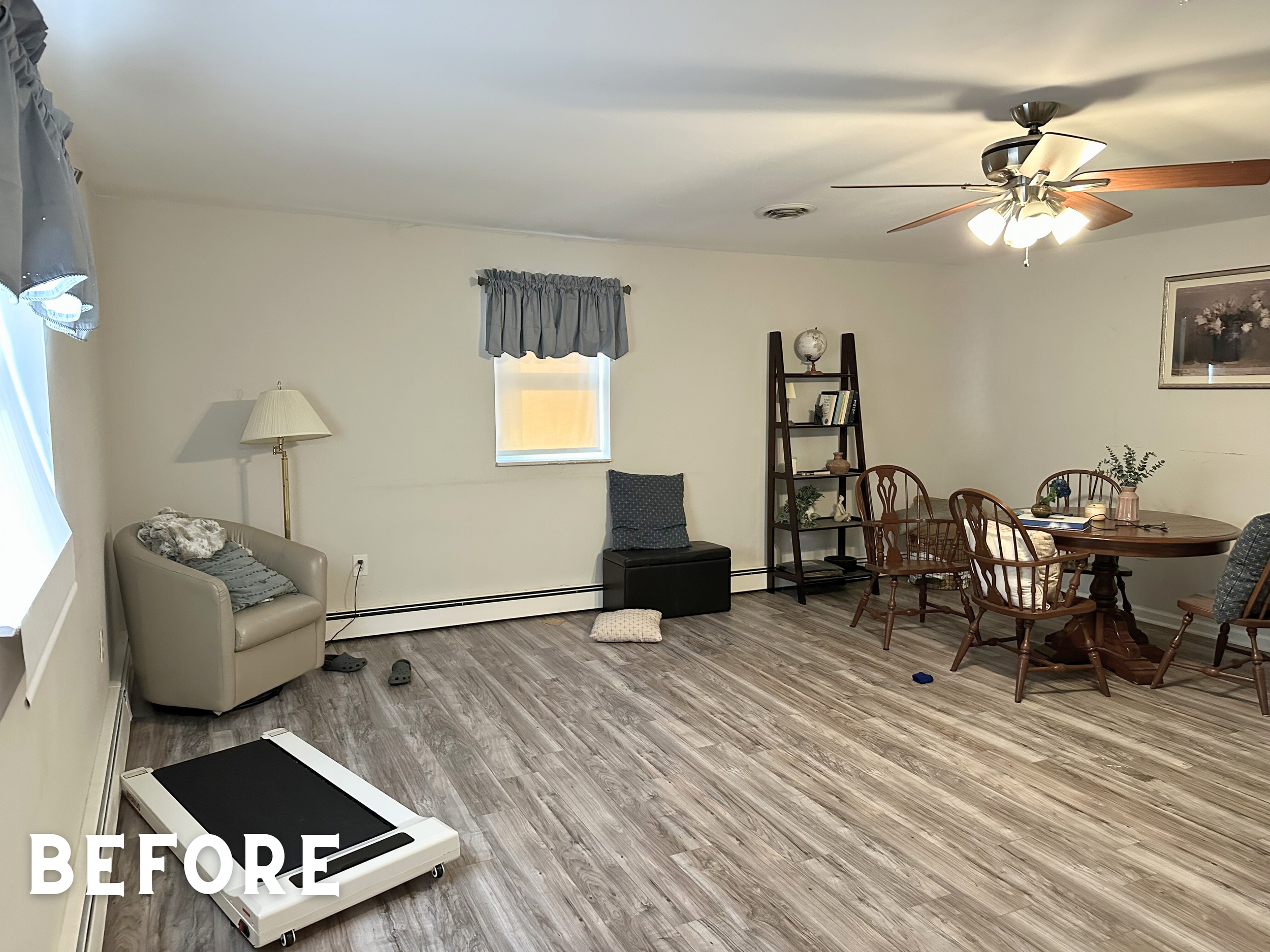 This living room was a nearly blank slate. I worked together with the client to curate a homey living space that showcased some of her favorite thrifted decor. We made sure to incorporate some of her existing furniture while filling out the room with