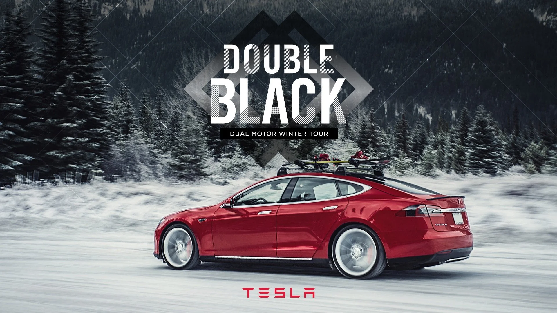 A red Tesla Model S driving on a snowy road in a forest with snow-covered evergreen trees in the background. Overlaid text reads 'Double Black Dual Motor Winter Tour' along with the Tesla logo.