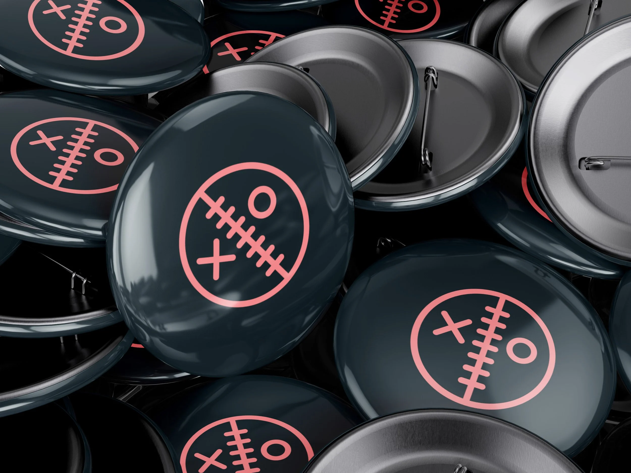 Pins mit Logo im neuen neuen Branding von VoodooMerge