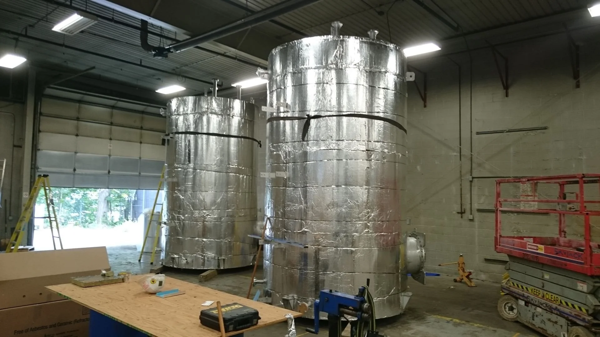Hawman Container Services Custom Fabricated 304SS API 650 Tanks for Alberta SAGD Oil & Gas Reagent Injection – Insulated & Cladded 2.jpeg
