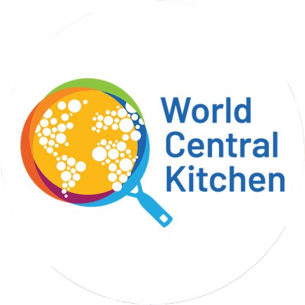 Logo of World Central Kitchen with a magnifying glass over a globe of white dots on a yellow background, surrounded by colorful rings.