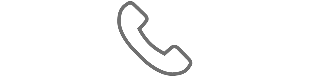 Icon of a black telephone handset on a white background.