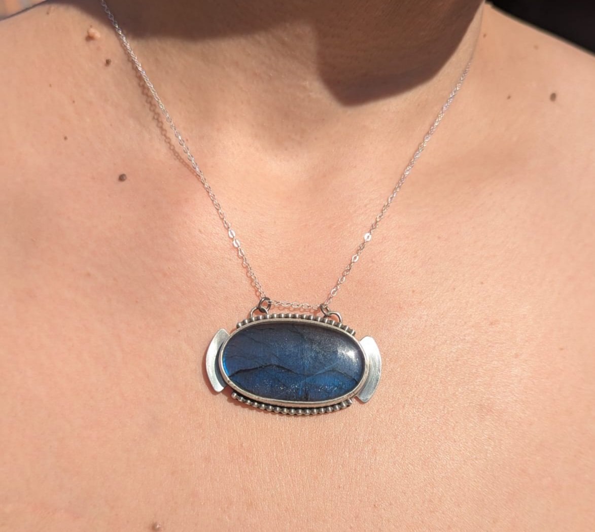 Large labradorite patina worn in sun darker front view.jpg