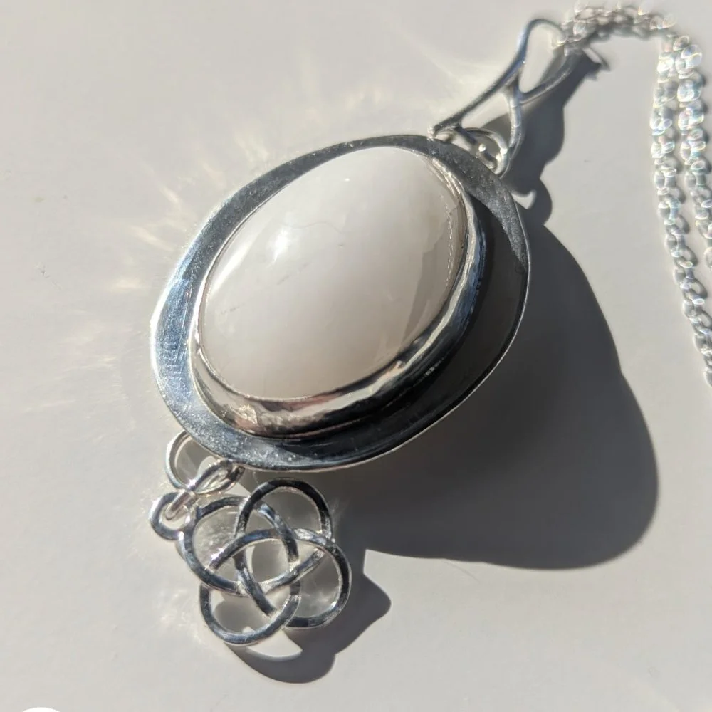 Scottish Balmarino Snow Quartz and silver celtic pendant.jpg