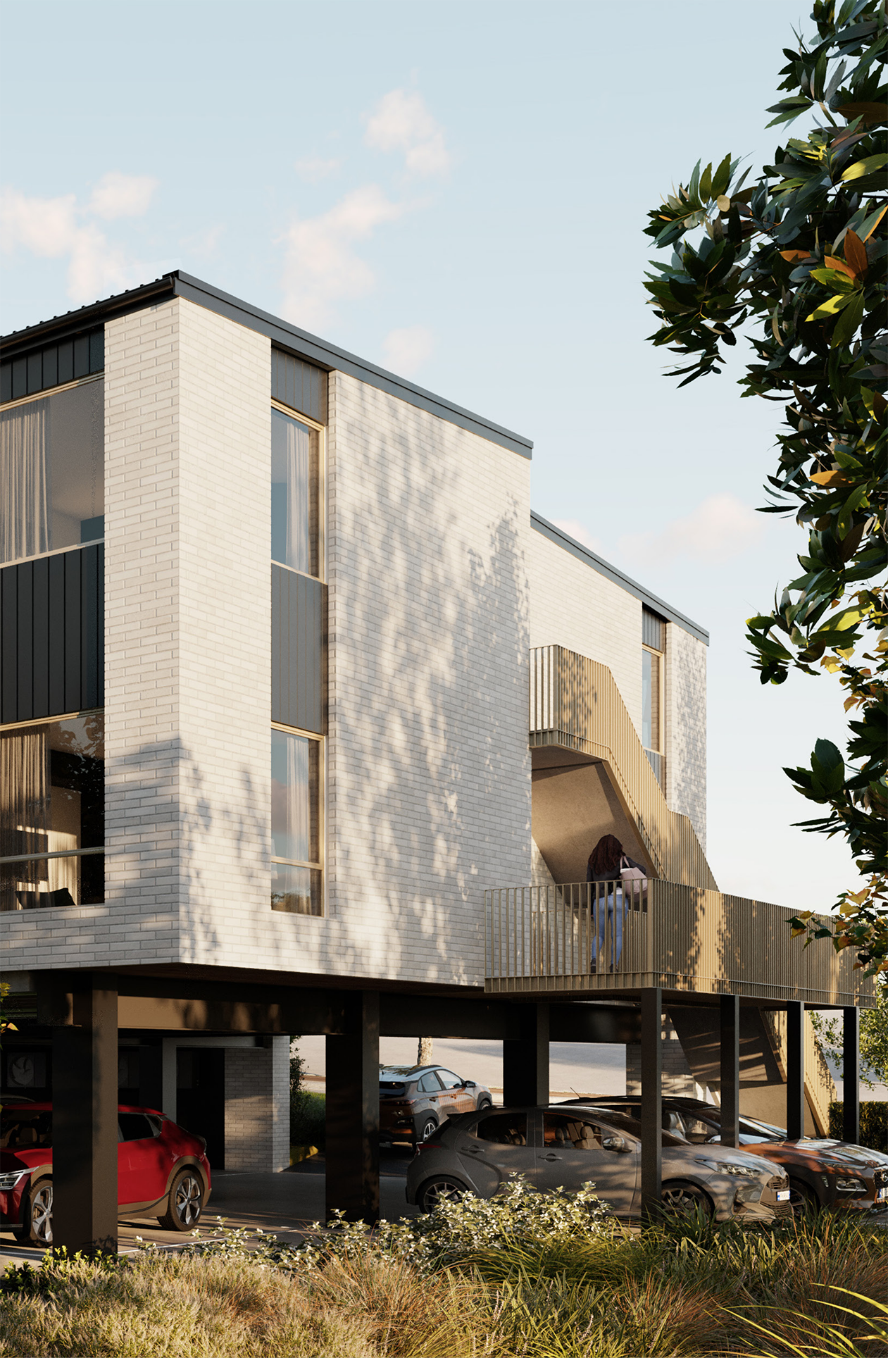 Modern multi-story residential building with parking underneath, people on the balcony, trees, and a clear sky.