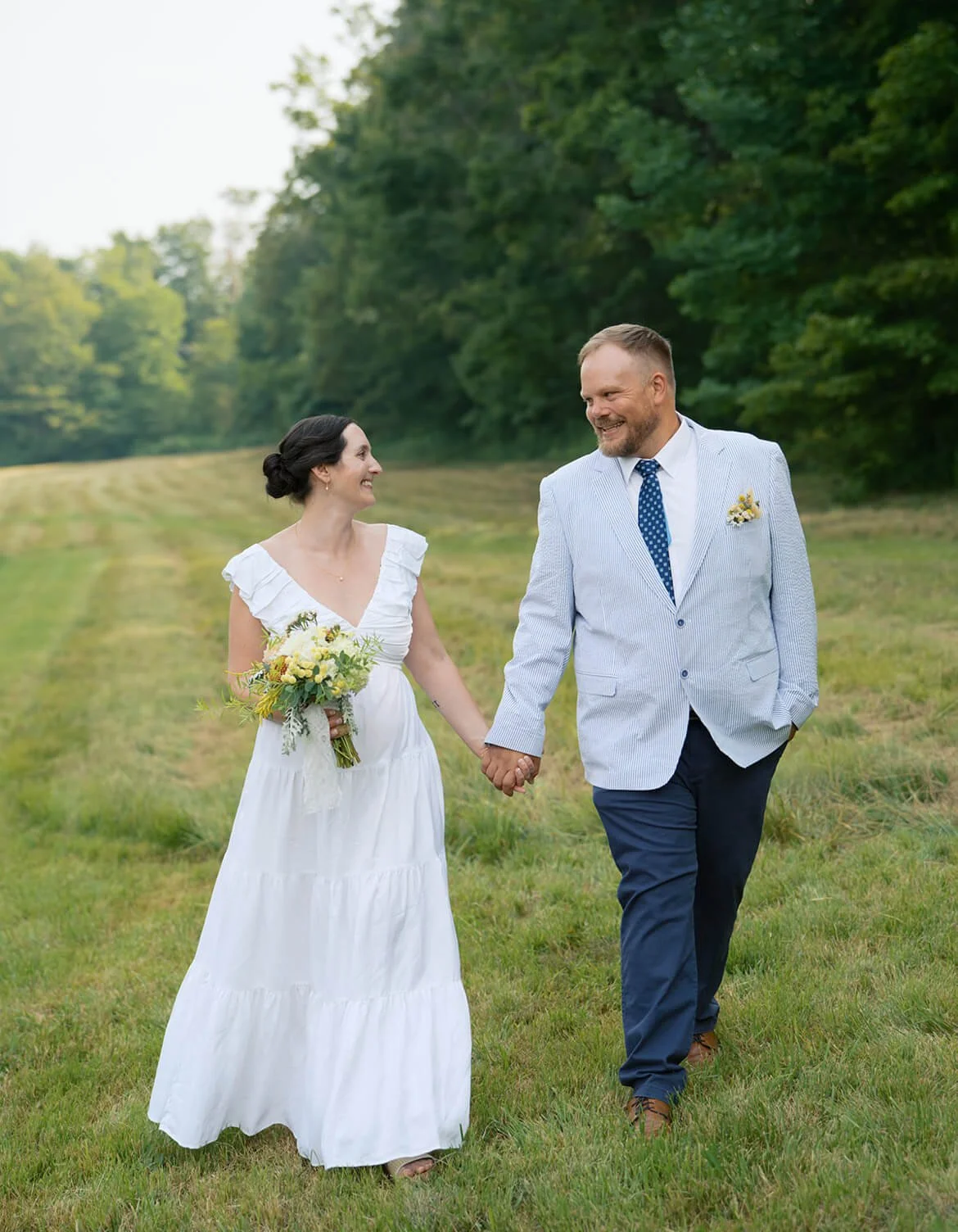 Bride and Groom with bouquet and boutonniere