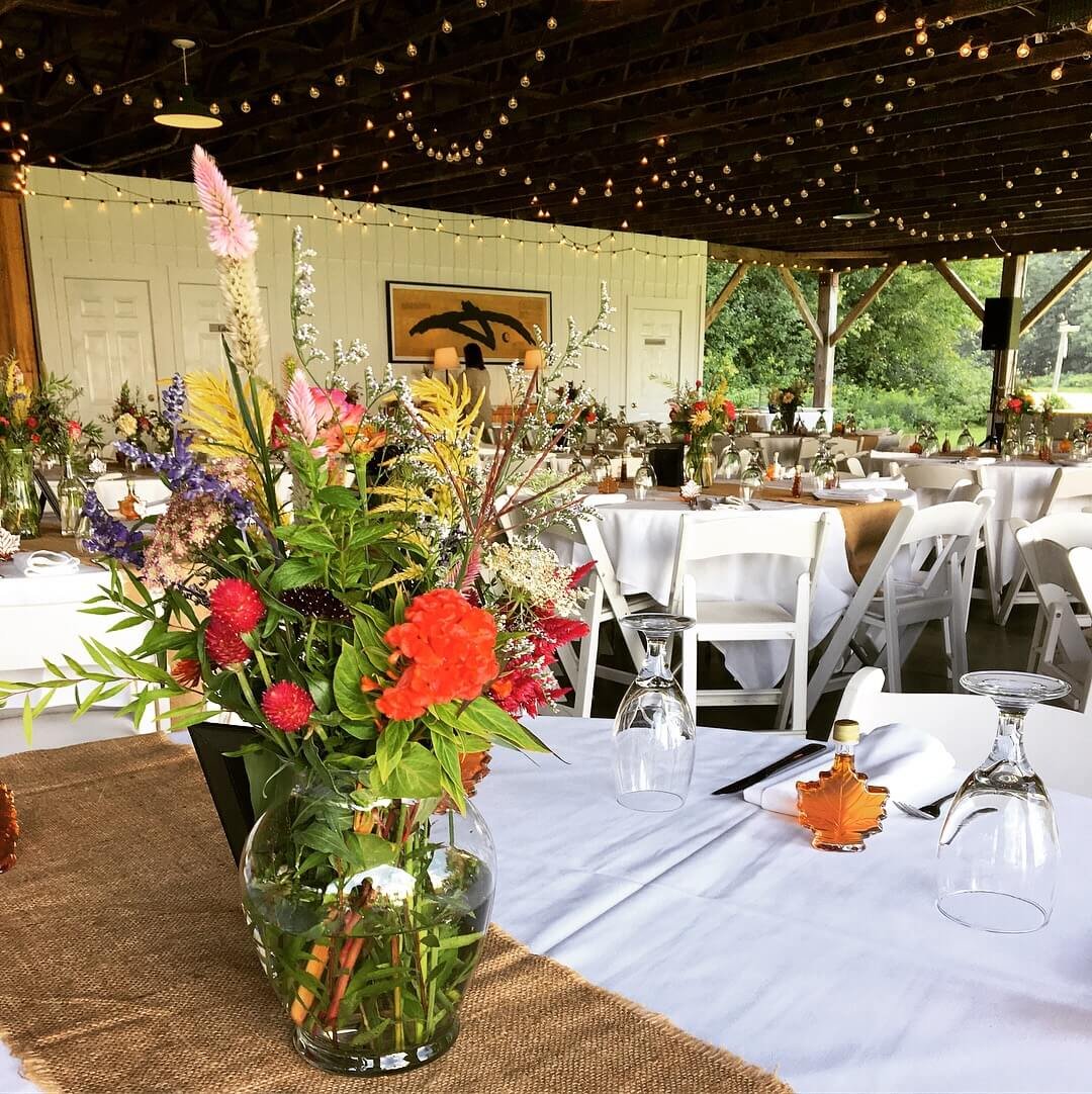 Dining Table at Wedding with Flowers and Twinkle Lights