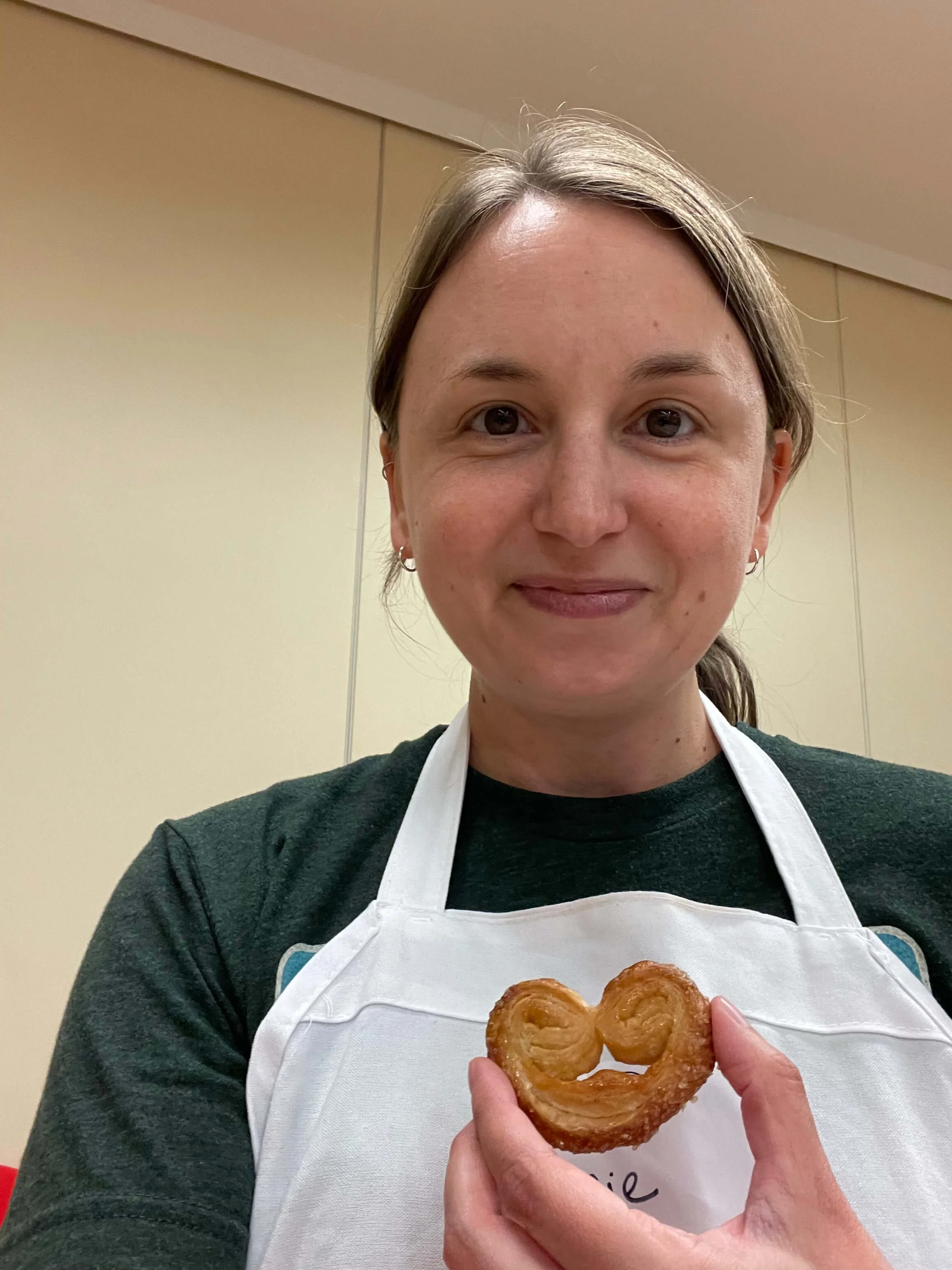 Woman Holding Heart Shaped Cookie