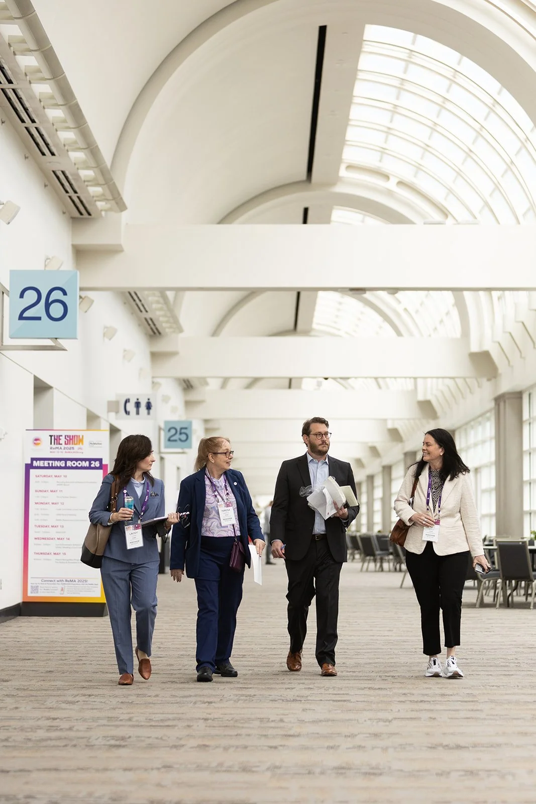People networking at a convention in San Diego