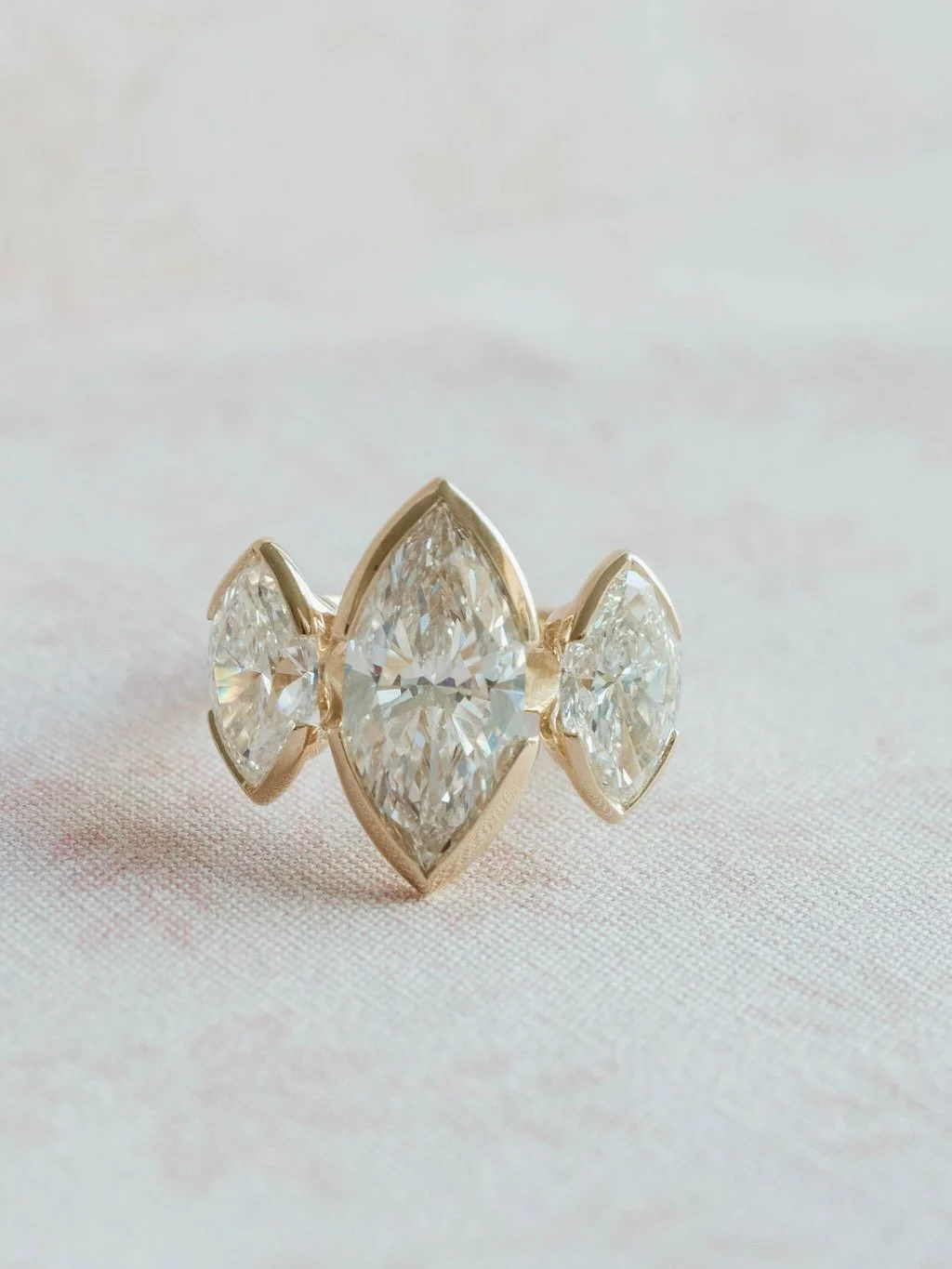 It&rsquo;s called balance, google it!! ✨

Half bezeled &bull; 3.5 carat marquise &bull; 1.5 carats on each side to match 💍

[ three stone diamond ring , marquise diamond ring, marquis engagement ring ]