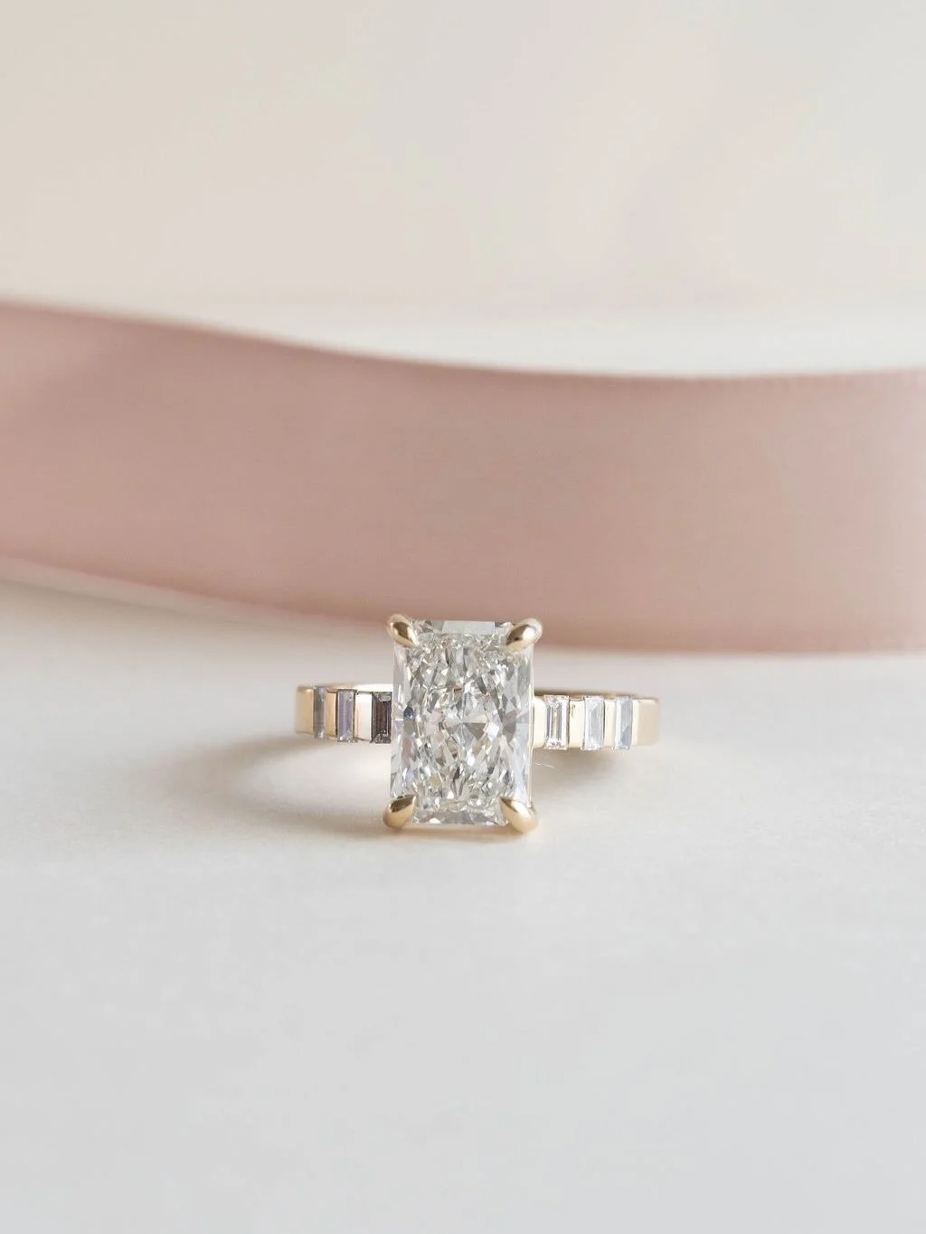 Throw this one in the ghosted designs box 😌

3.8 radiant center stone with bar baguettes <&mdash; I made that up but sounds good 🫶

[radiant engagement ring , radiant diamond ring, radiant diamond , dream engagement ring]