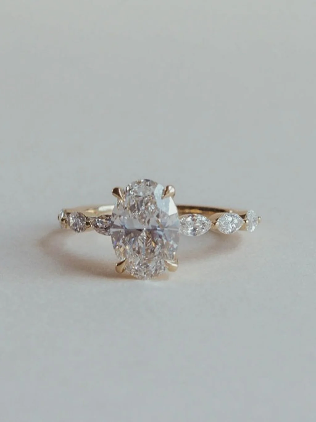 All the sparkle in the center &amp; sides ✨ 

[oval diamond ring, marquise side stones, oval engagement ring, oval dream ring]