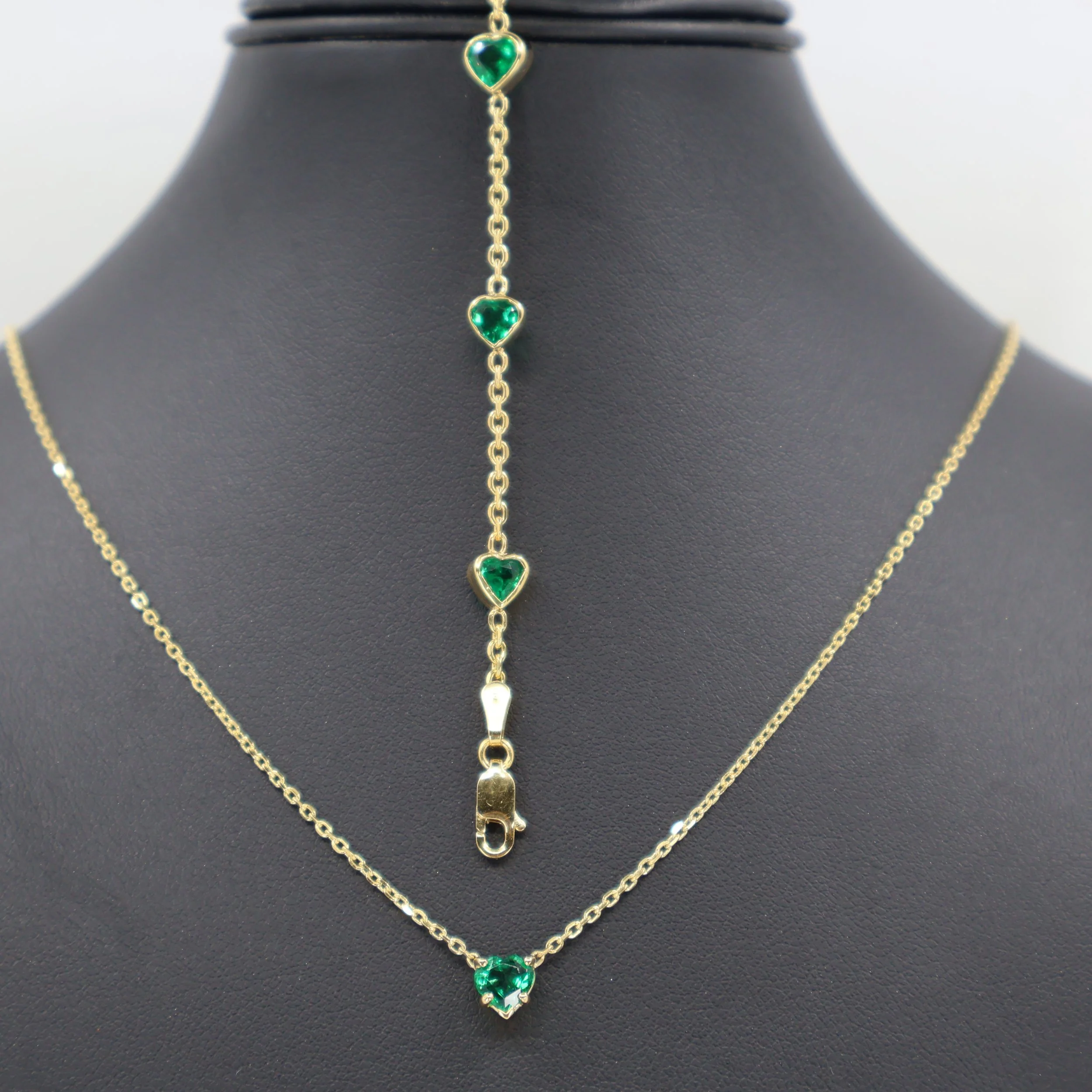 Custom gold necklace and bracelet set with green jade heart-shaped gemstones