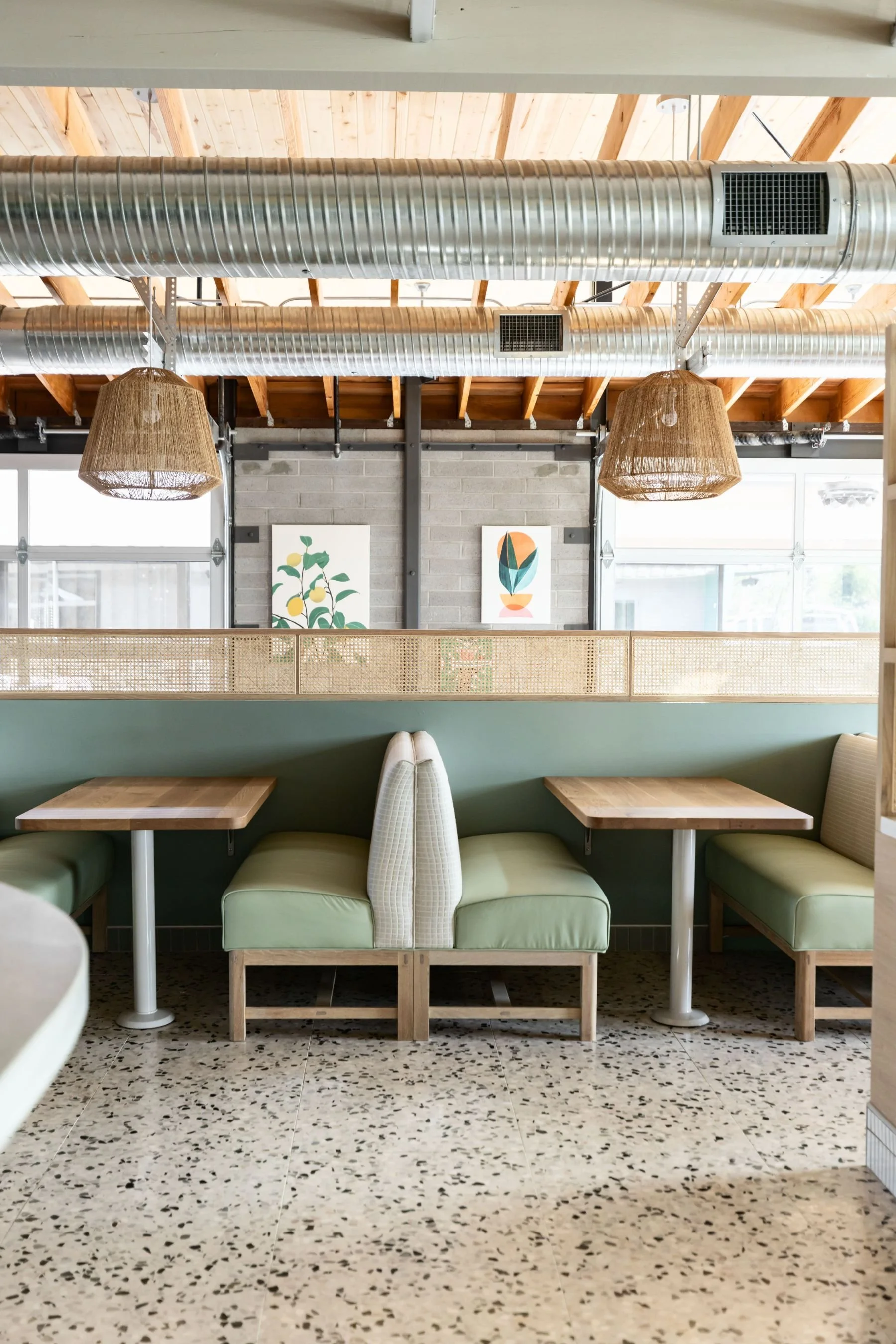the-eleanor-restaurant-booth-seating-pendant-lighting.jpeg