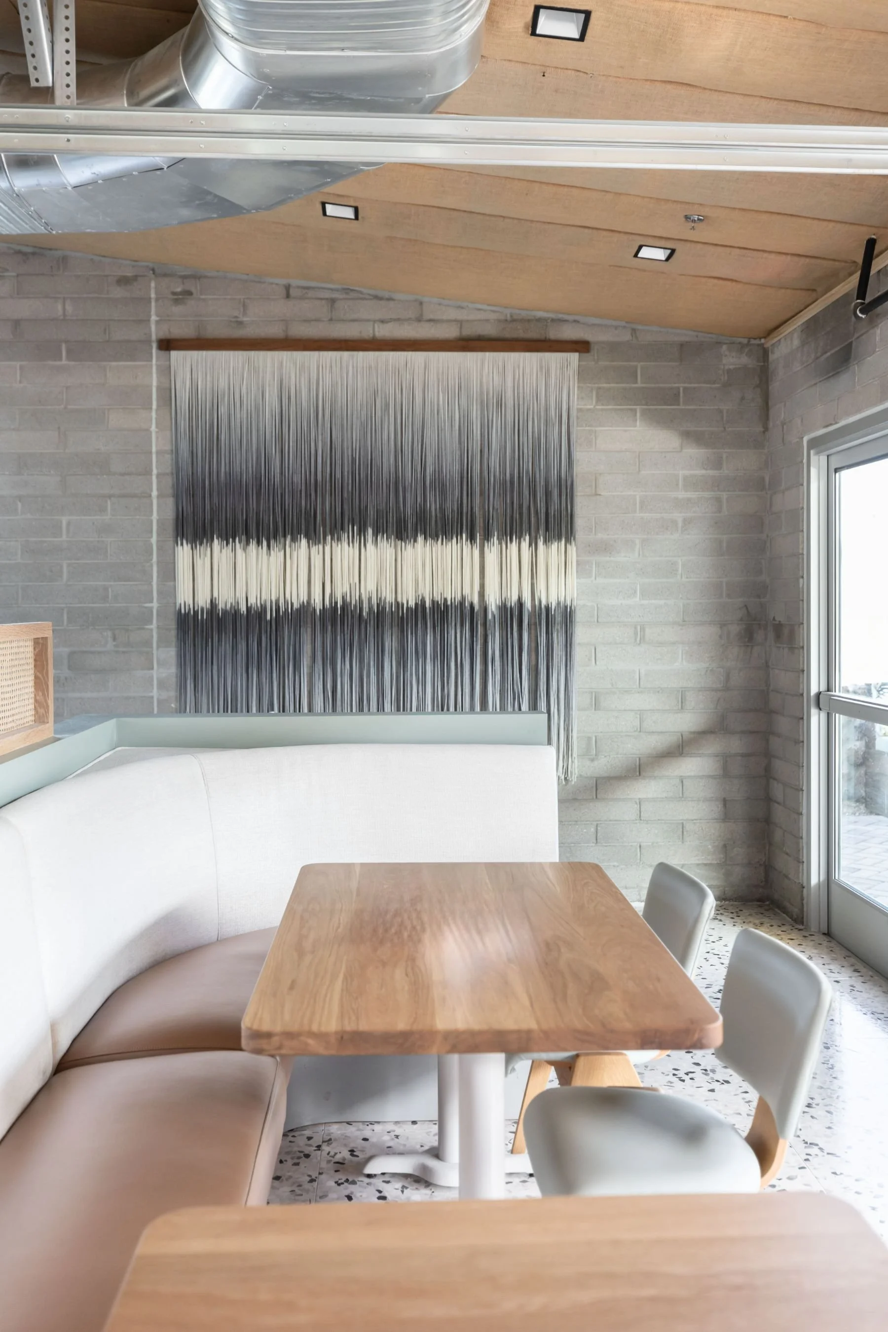 the-eleanor-restaurant-dining-room-accent-wall-design.jpeg