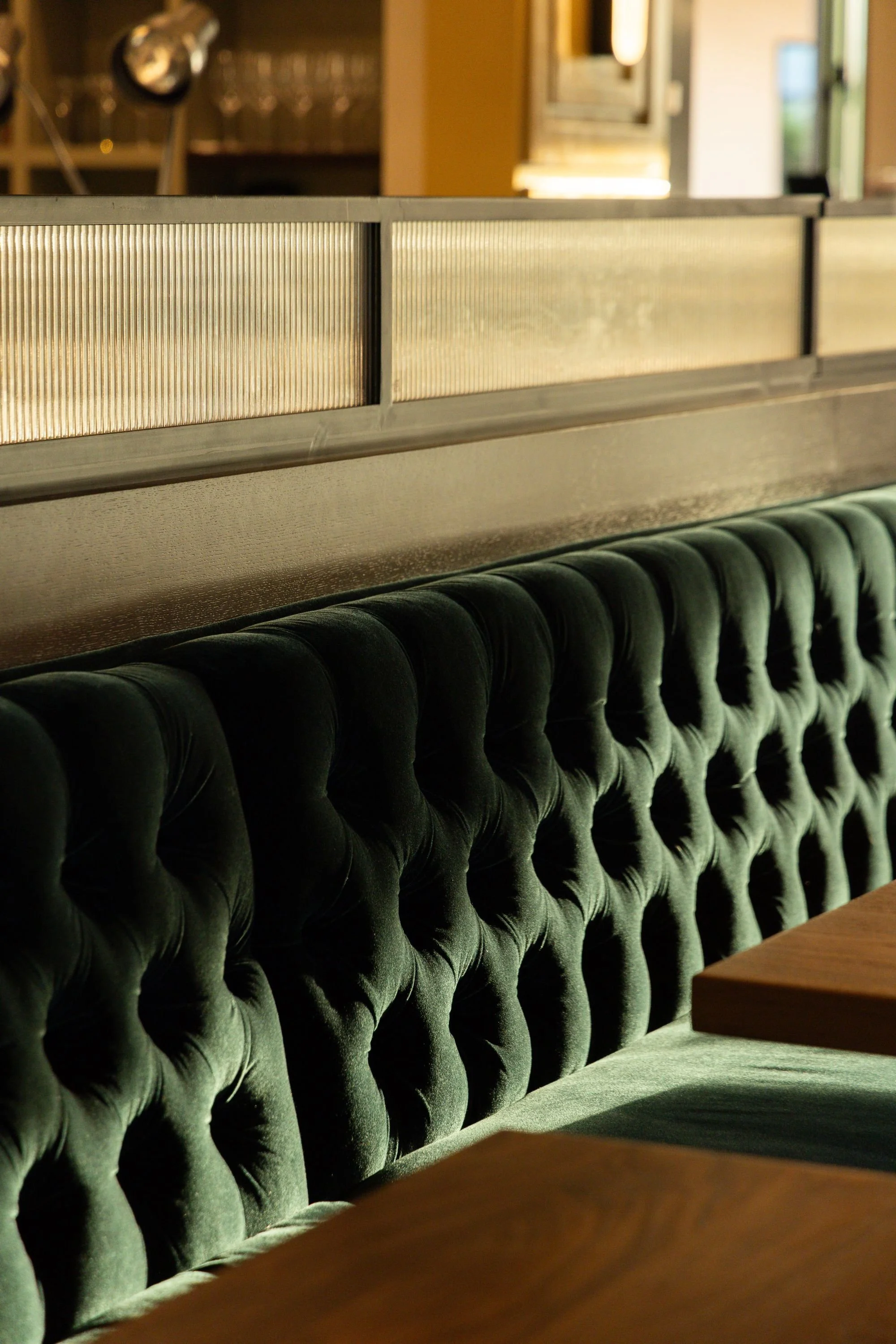 sparrow-restaurant-green-tufted-booth-detail-design.jpeg