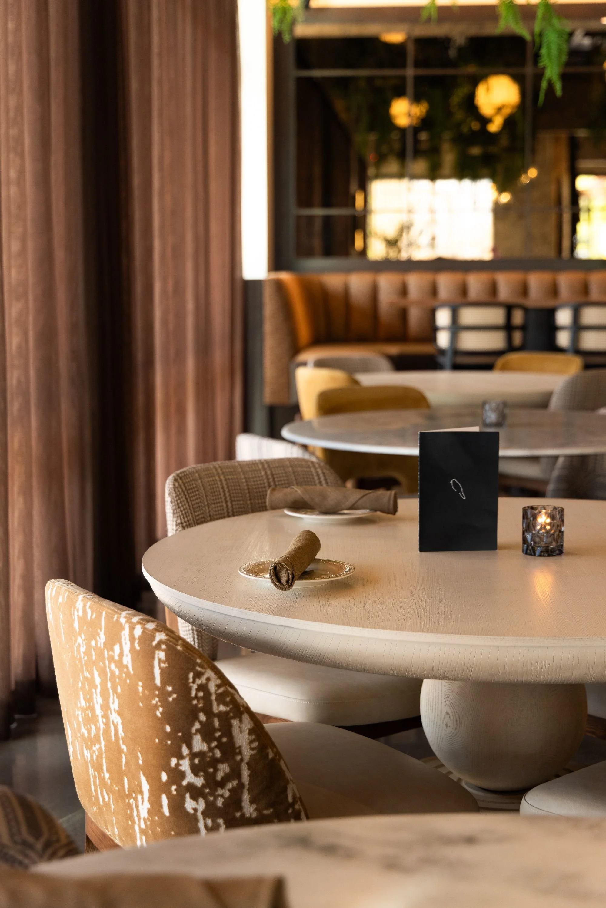 sparrow-restaurant-marble-table-booth-seating-design.jpeg