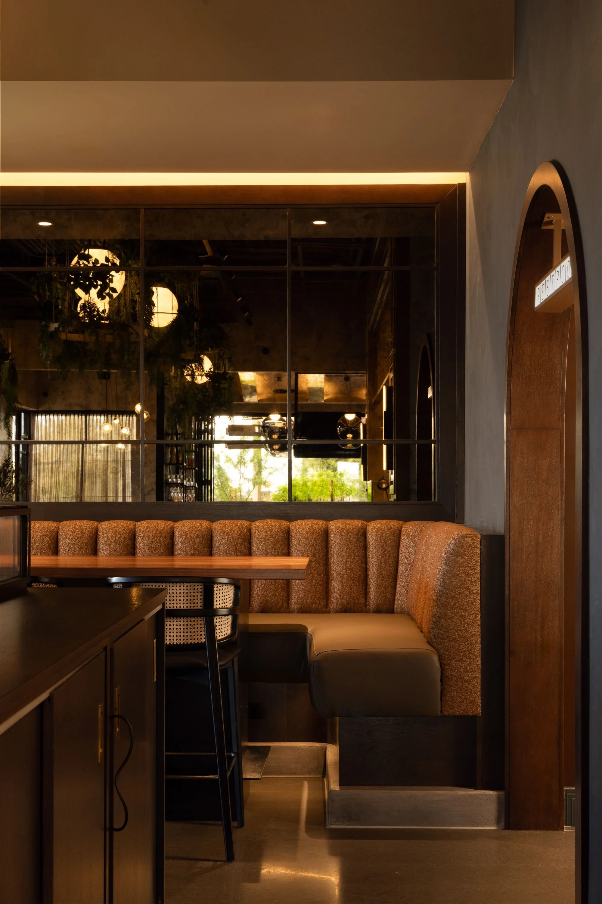 sparrow-restaurant-wraparound-booth-seating-design.jpeg