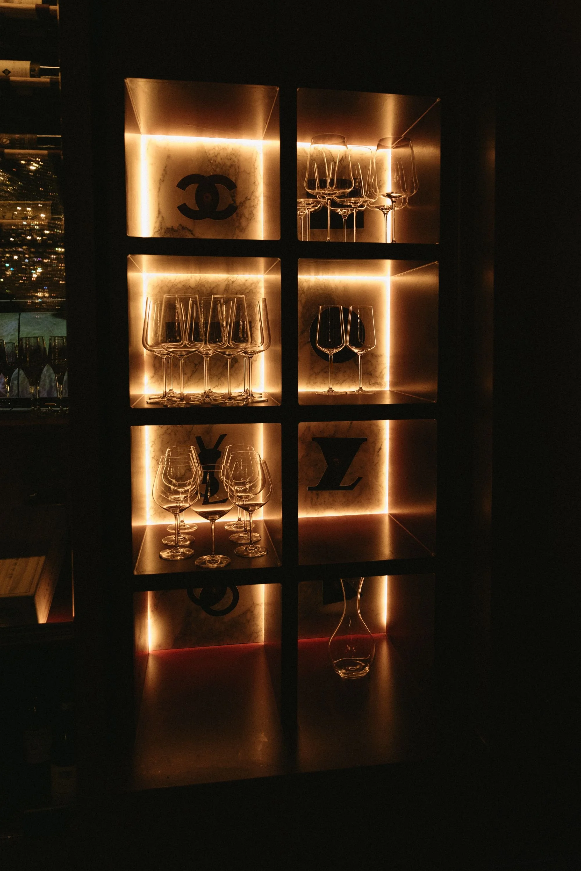 the-guest-house-austin-pdr-backlit-wine-grid-wall.jpeg