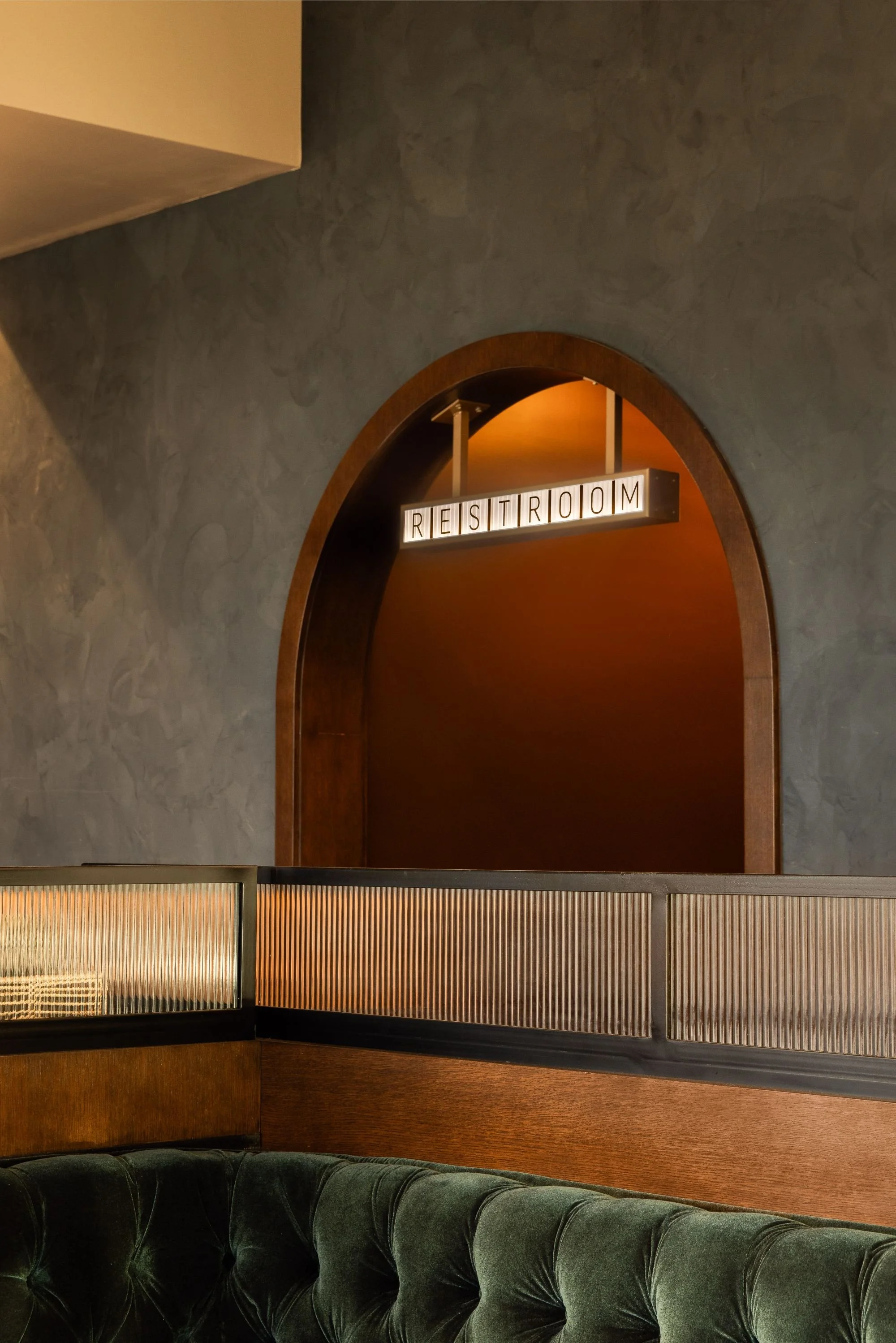 sparrow-restaurant-dark-booth-arched-window-interior.jpeg