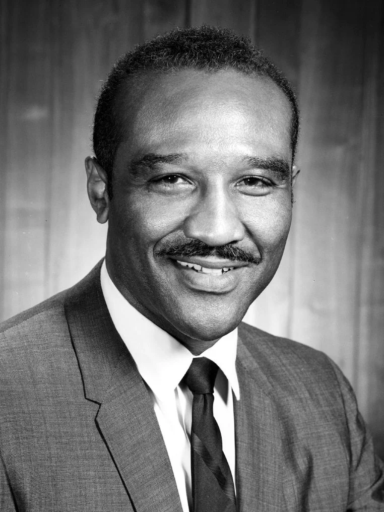 Black and white official portrait of Leon Williams